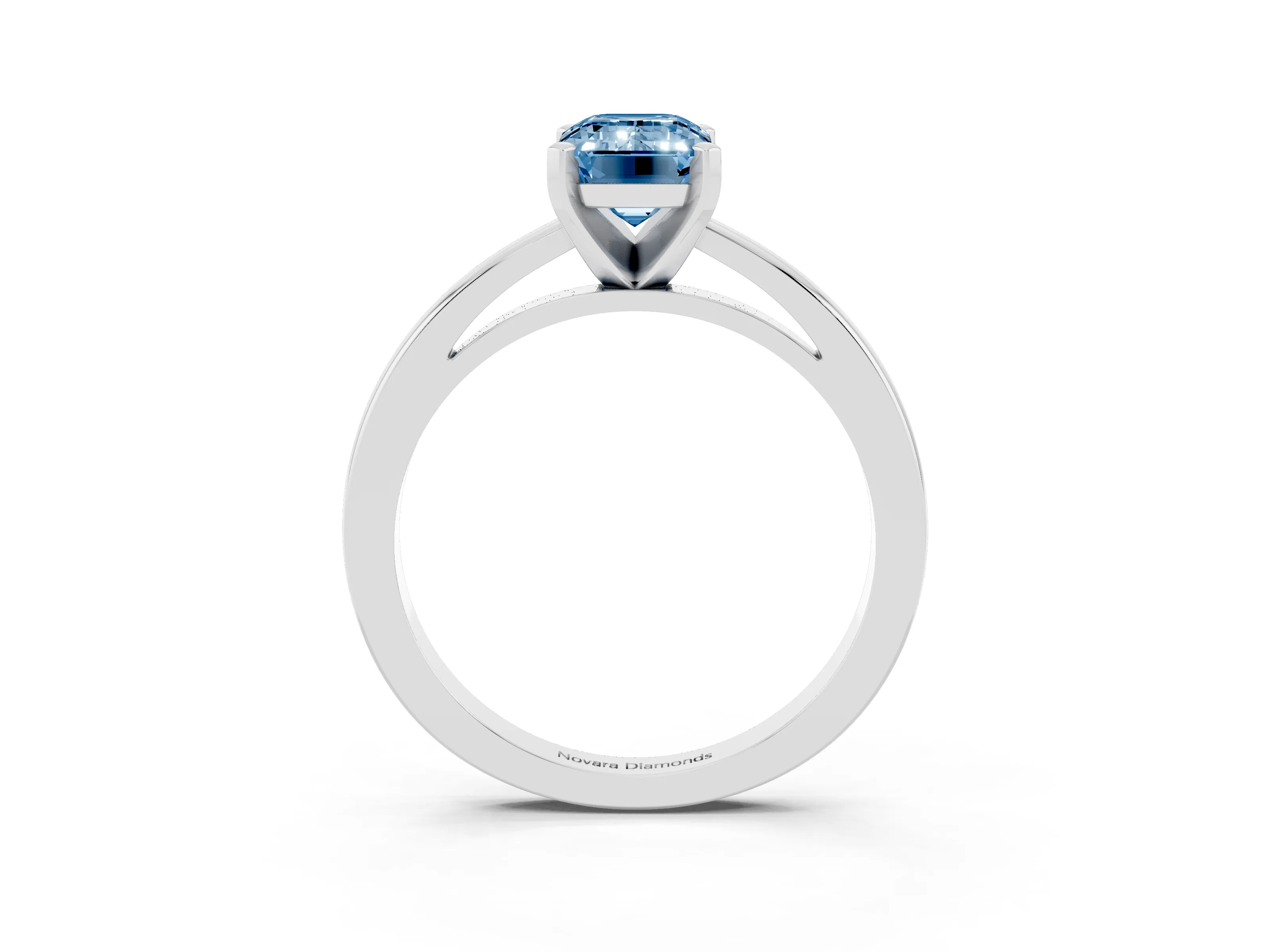 Fancy Blue Emerald Cut Diamond Solitaire Engagement Ring Set in Platinum with Prong Setting on a Classic Band