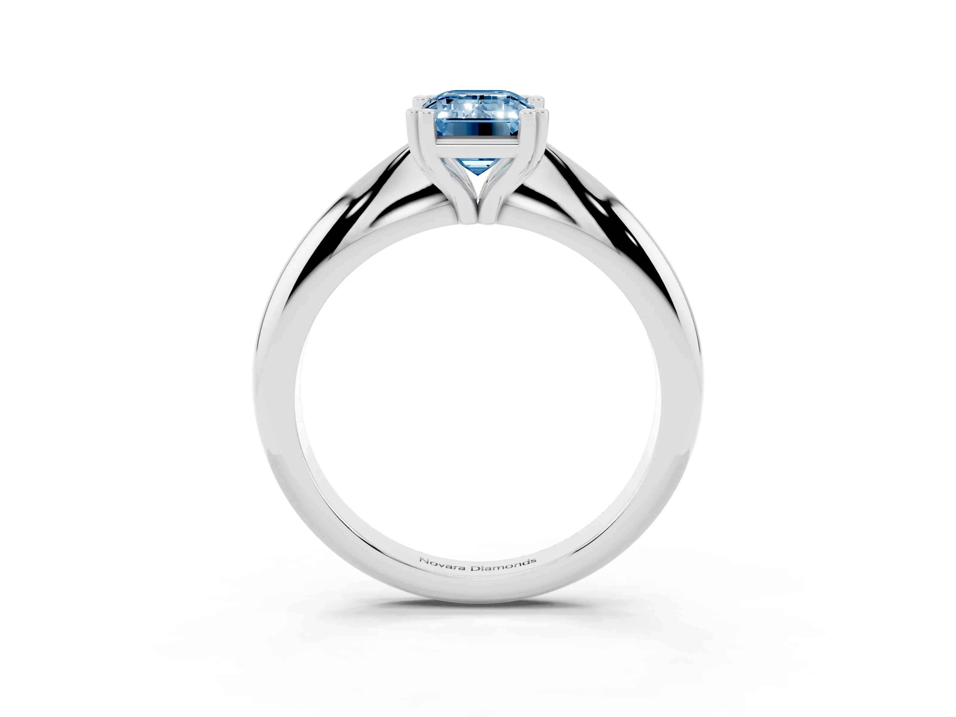 Fancy Blue Emerald Cut Diamond Solitaire Engagement Ring Set in White gold with Tapered Band and Prong Setting