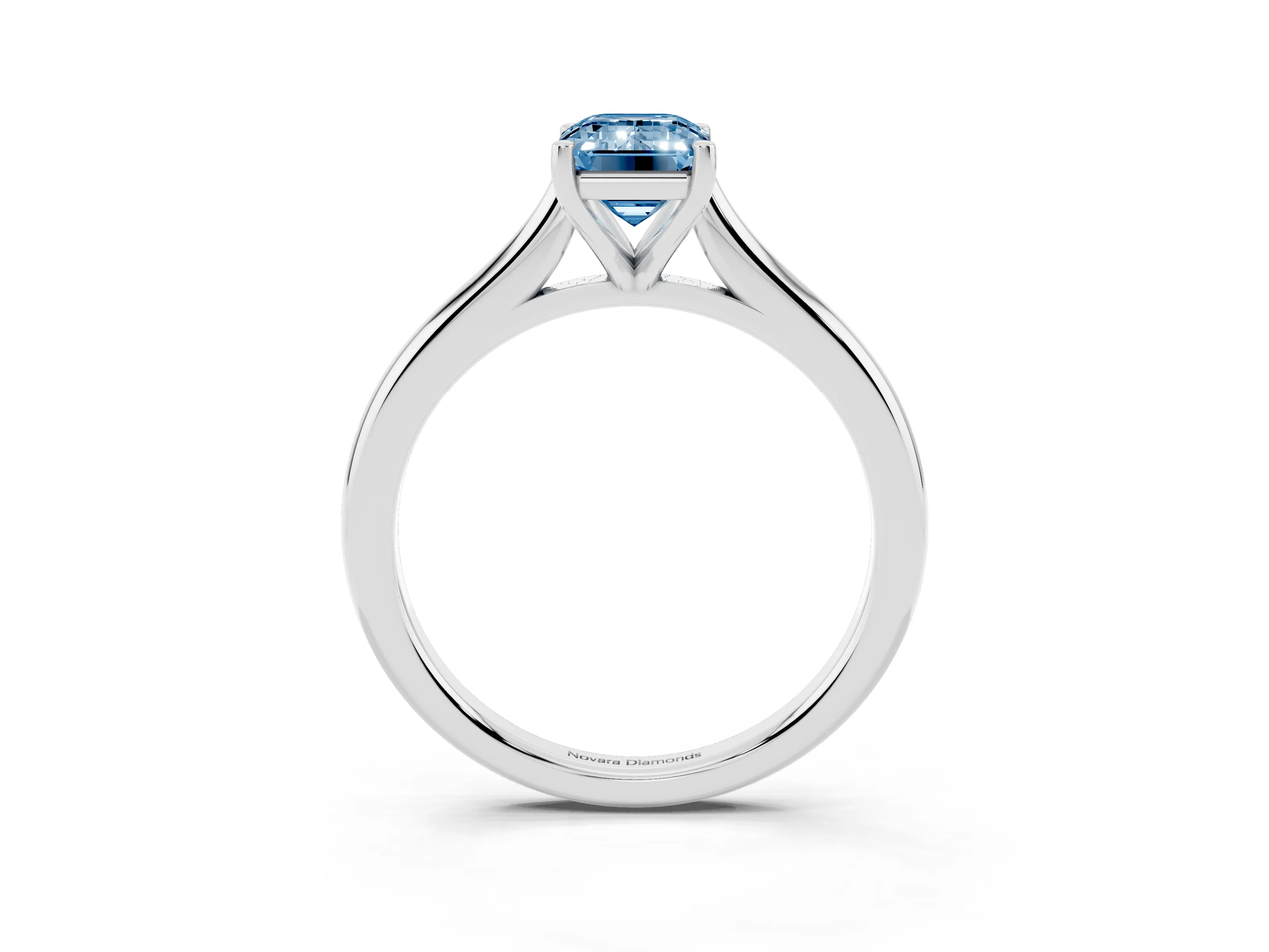Fancy Blue Emerald Cut Diamond Solitaire Ring Set in White gold with Cathedral Band and Prong Setting