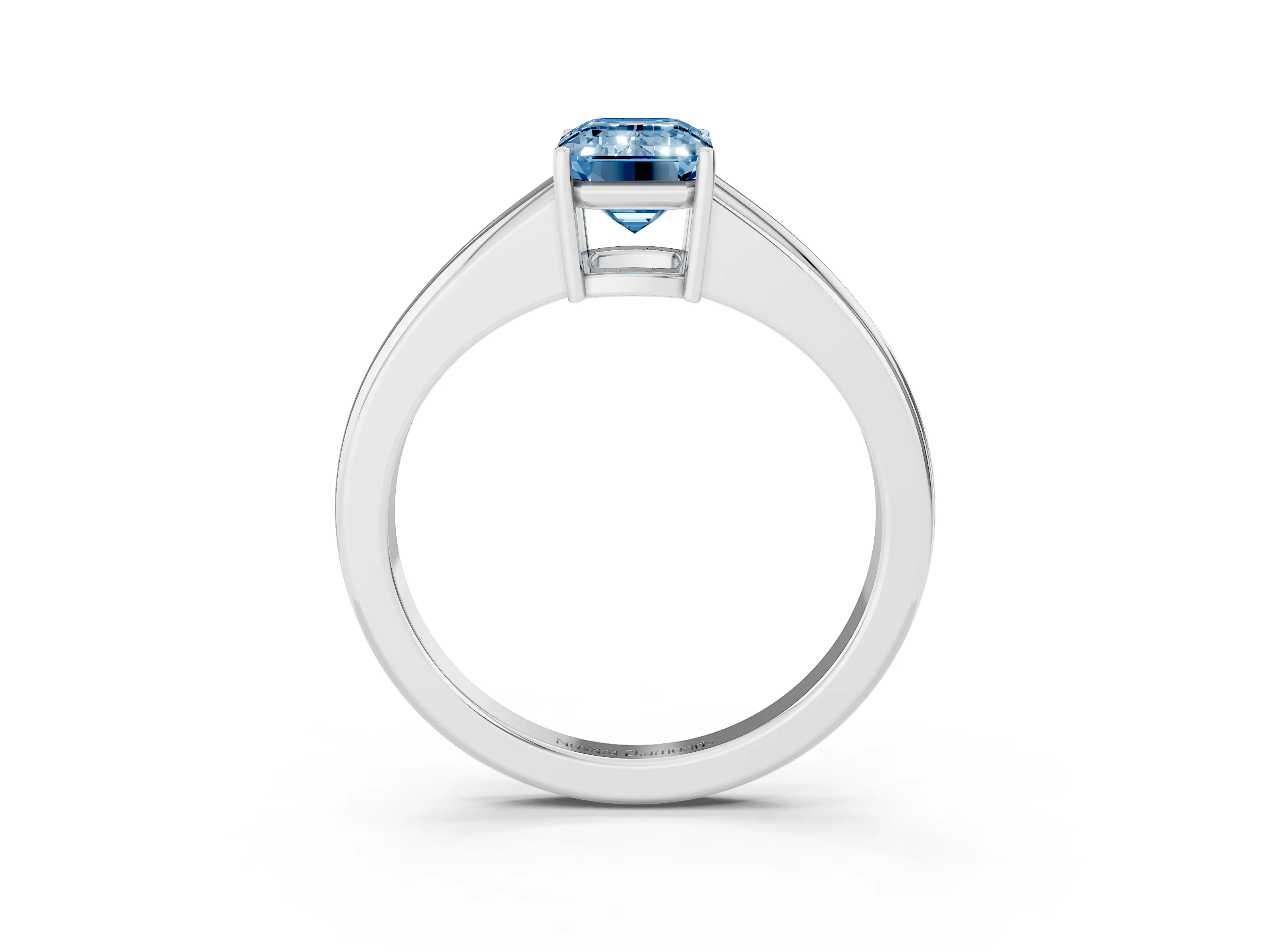 Fancy Blue Emerald Cut Diamond Solitaire Ring Set in White gold with Tapered Band and Prong Setting