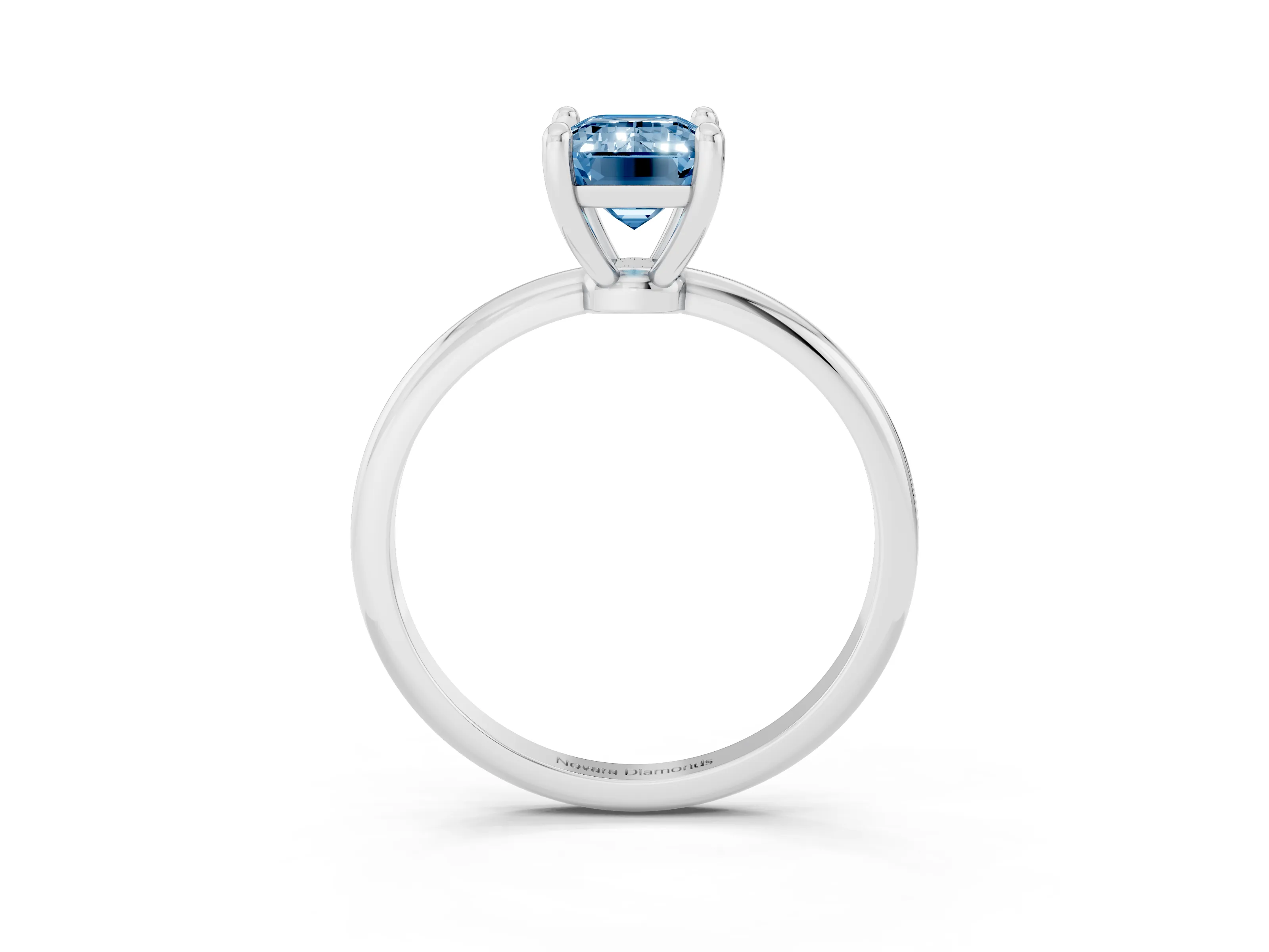 Fancy Blue Emerald Cut Diamond Solitaire Ring Set in Platinum with Secure Prong Setting on a Classic Band