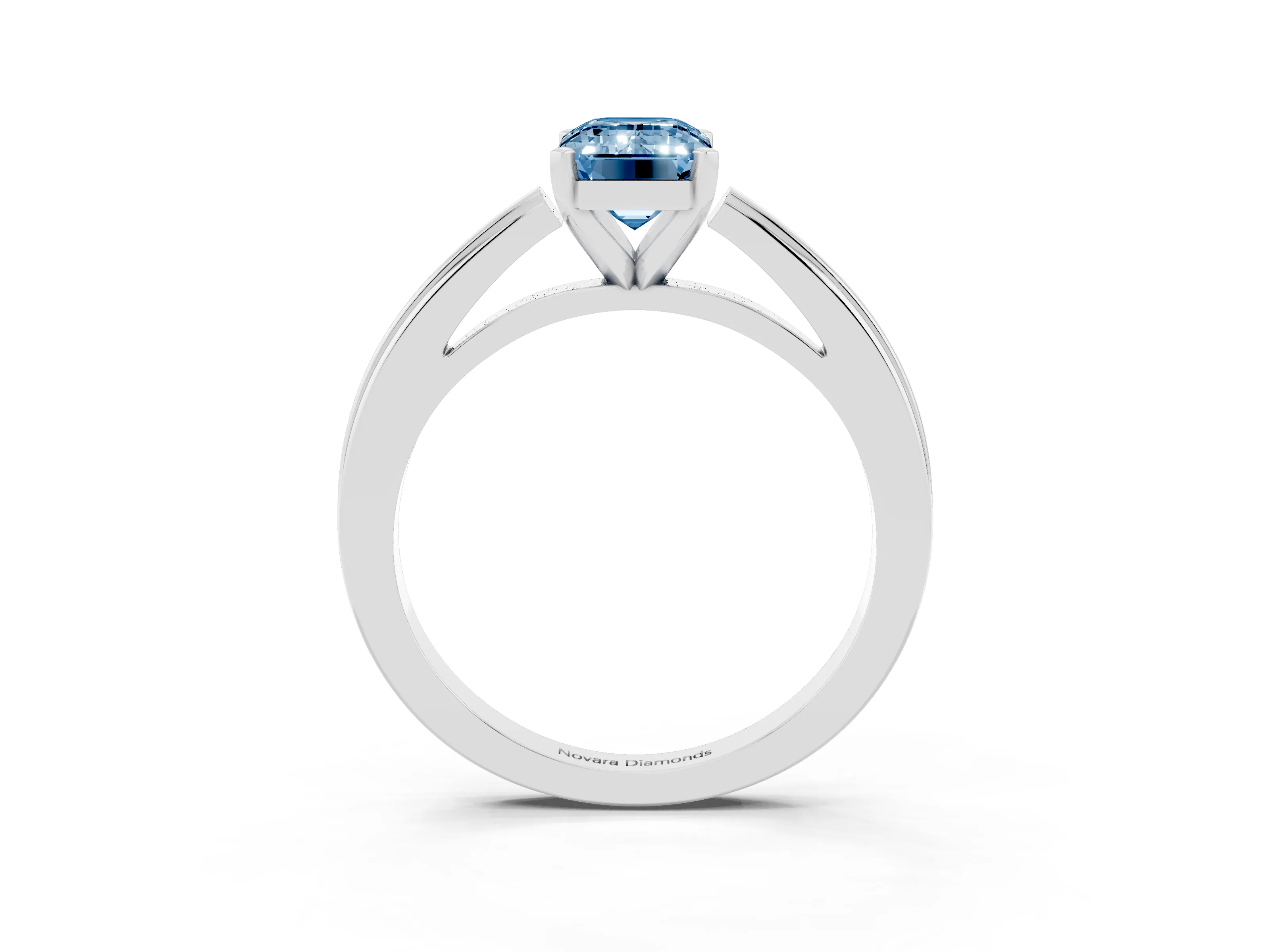 Fancy Blue Emerald Cut Diamond Solitaire Ring Set in Platinum with Prong Setting and Classic Band
