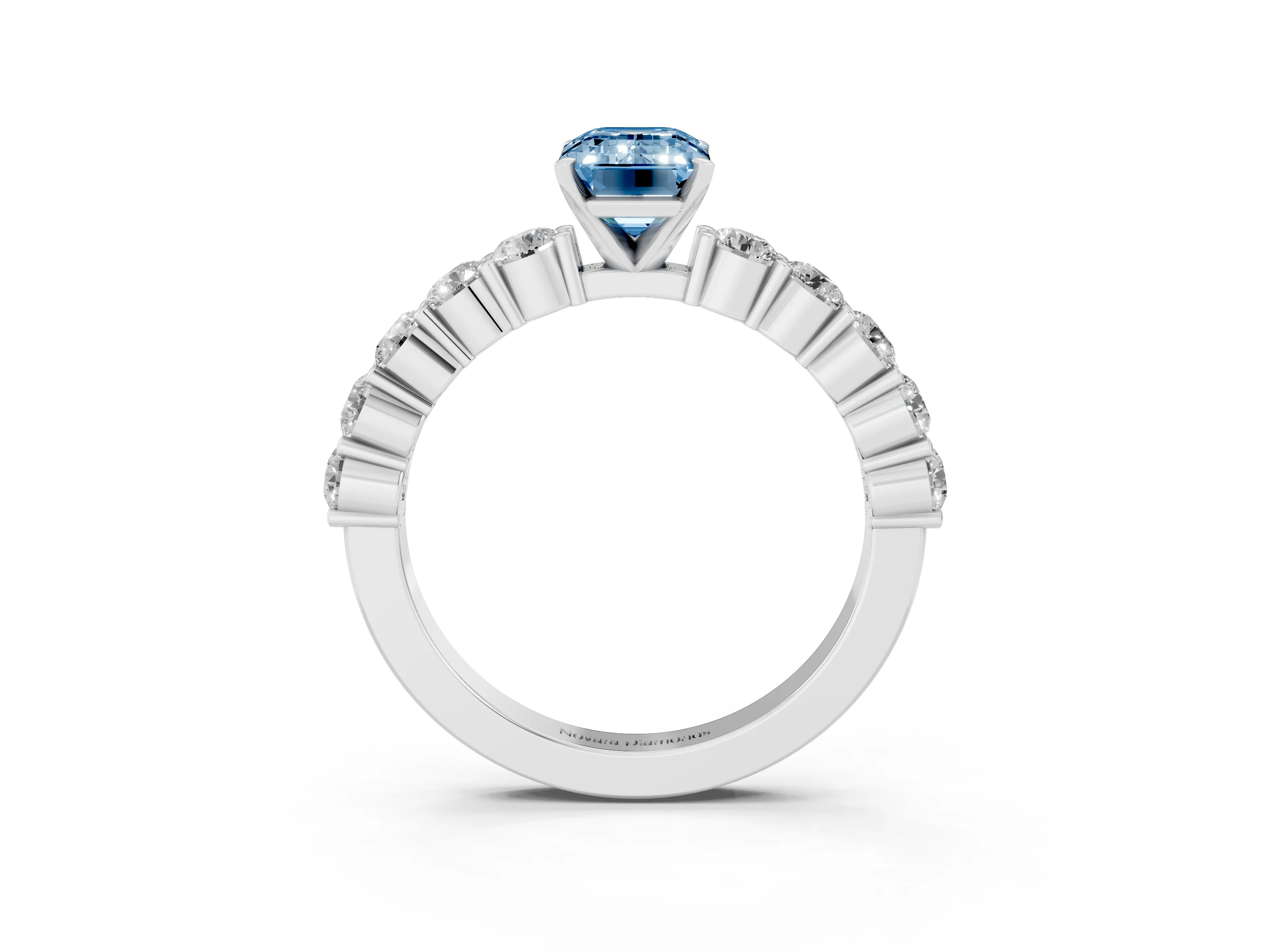 Fancy Blue Emerald Cut Diamond Solitaire Ring Set in White gold with Shared Prong Round Side Stones