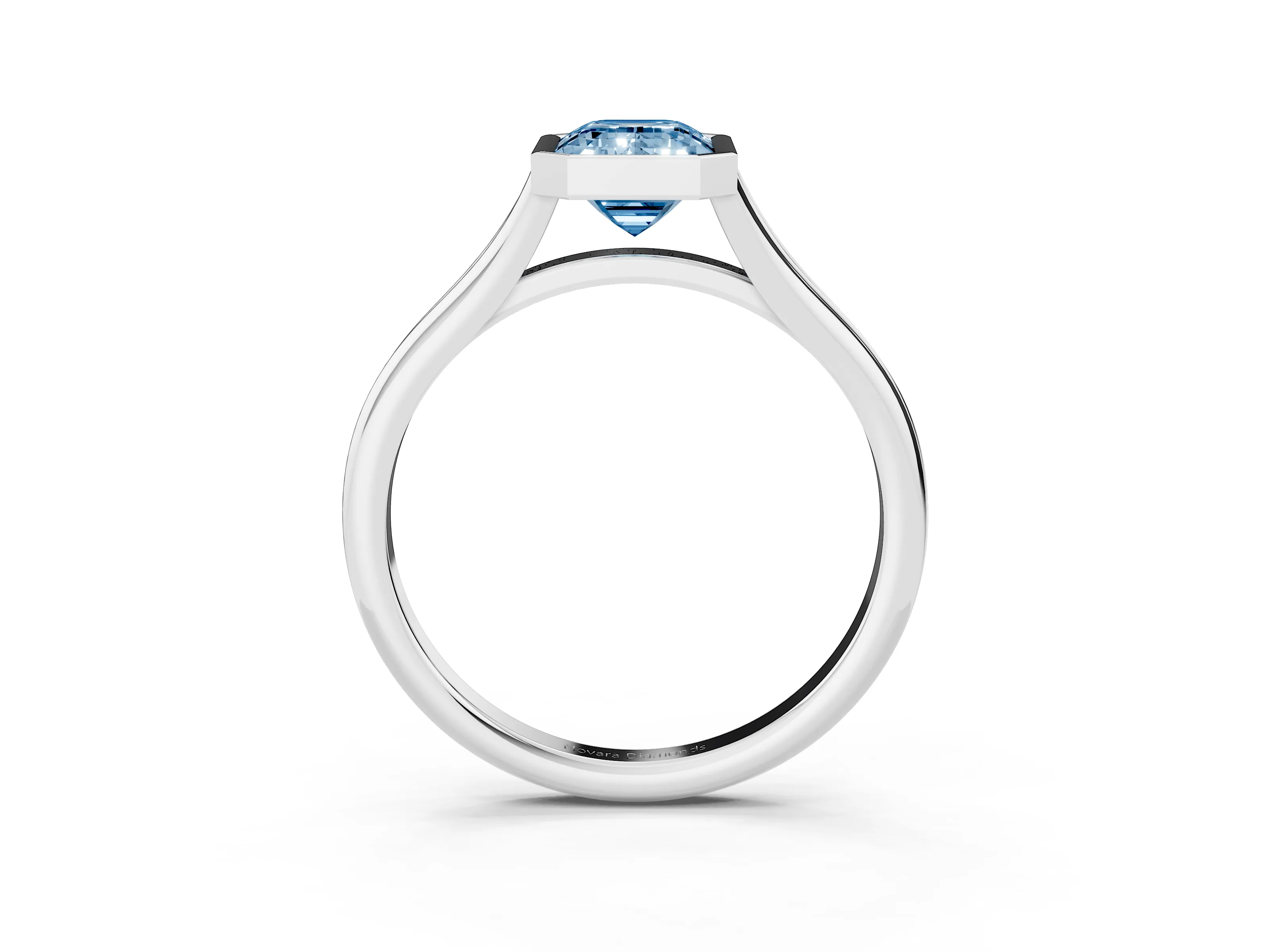 Fancy Blue Bezel Set Emerald Cut Diamond Solitaire Ring Set in Platinum with Tapered Band
