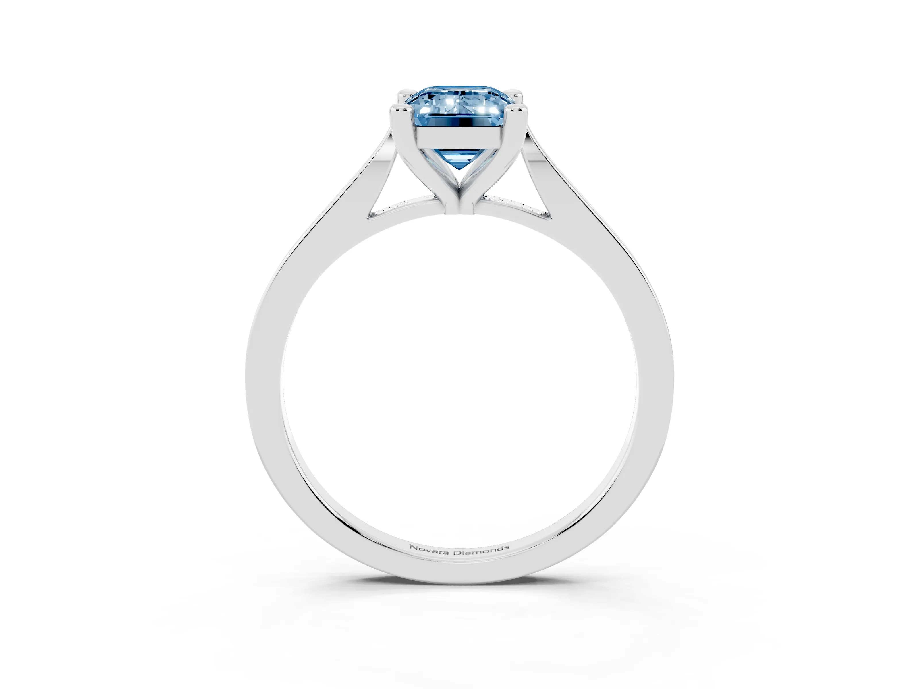 Fancy Blue Emerald Cut Diamond Solitaire Ring Set in White gold with Prong Setting and Tapered Band