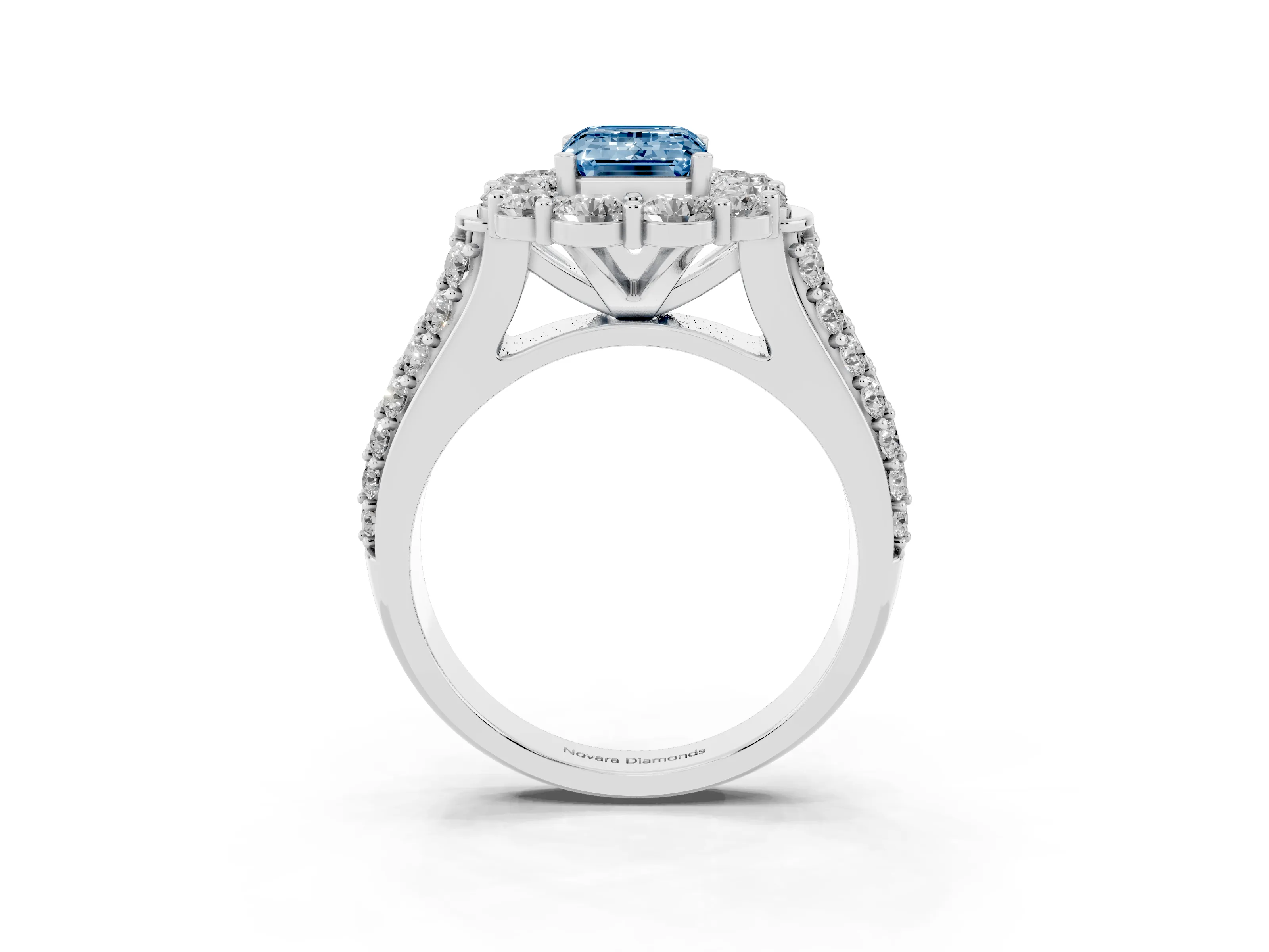 Fancy Blue Emerald Cut Diamond Halo Engagement Ring Set in Platinum with Split Shank and Prong Setting