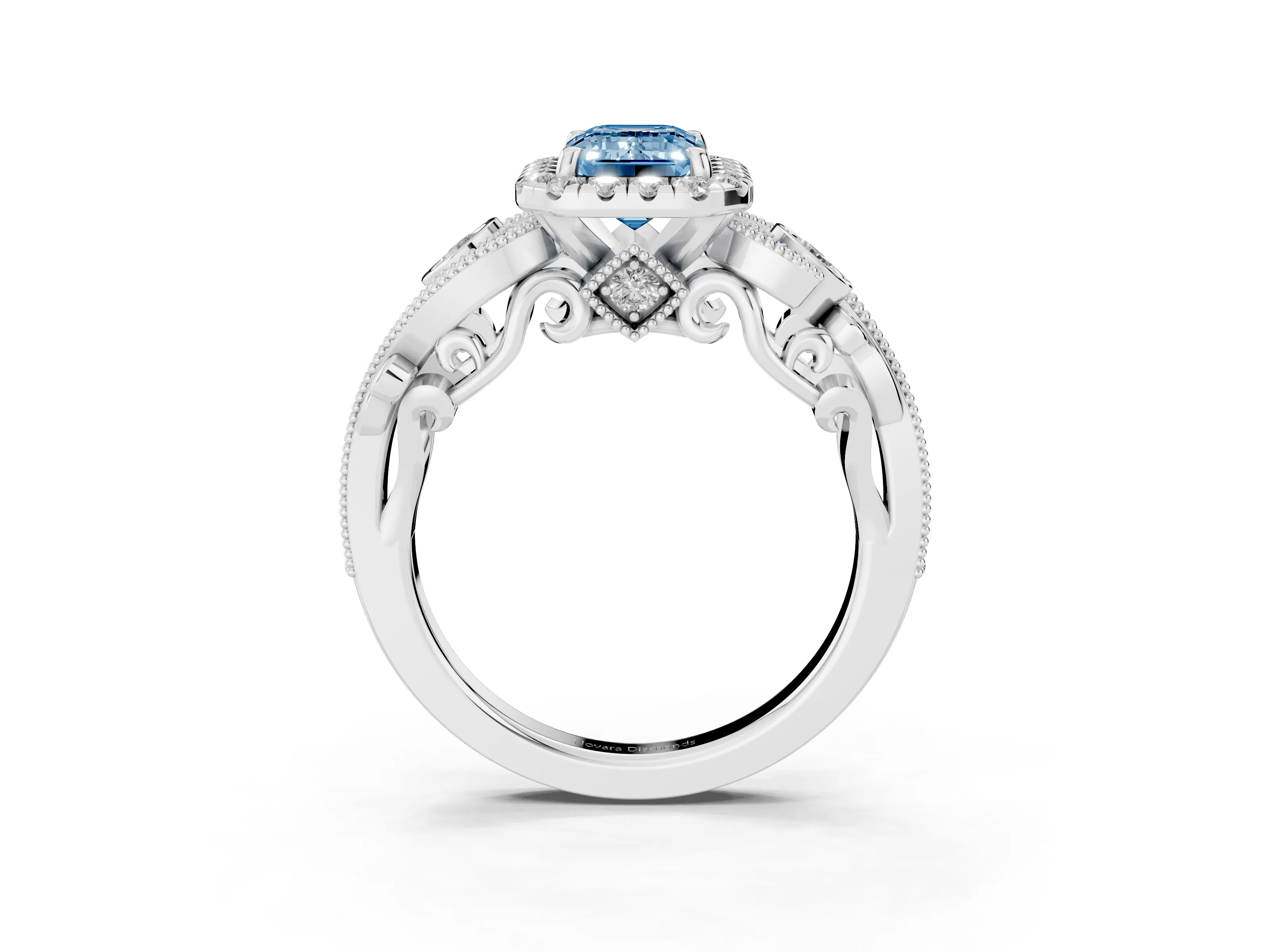 Fancy Blue Emerald Cut Diamond Halo Ring Set in Platinum with Milgrain Pavé Band and Prong Setting
