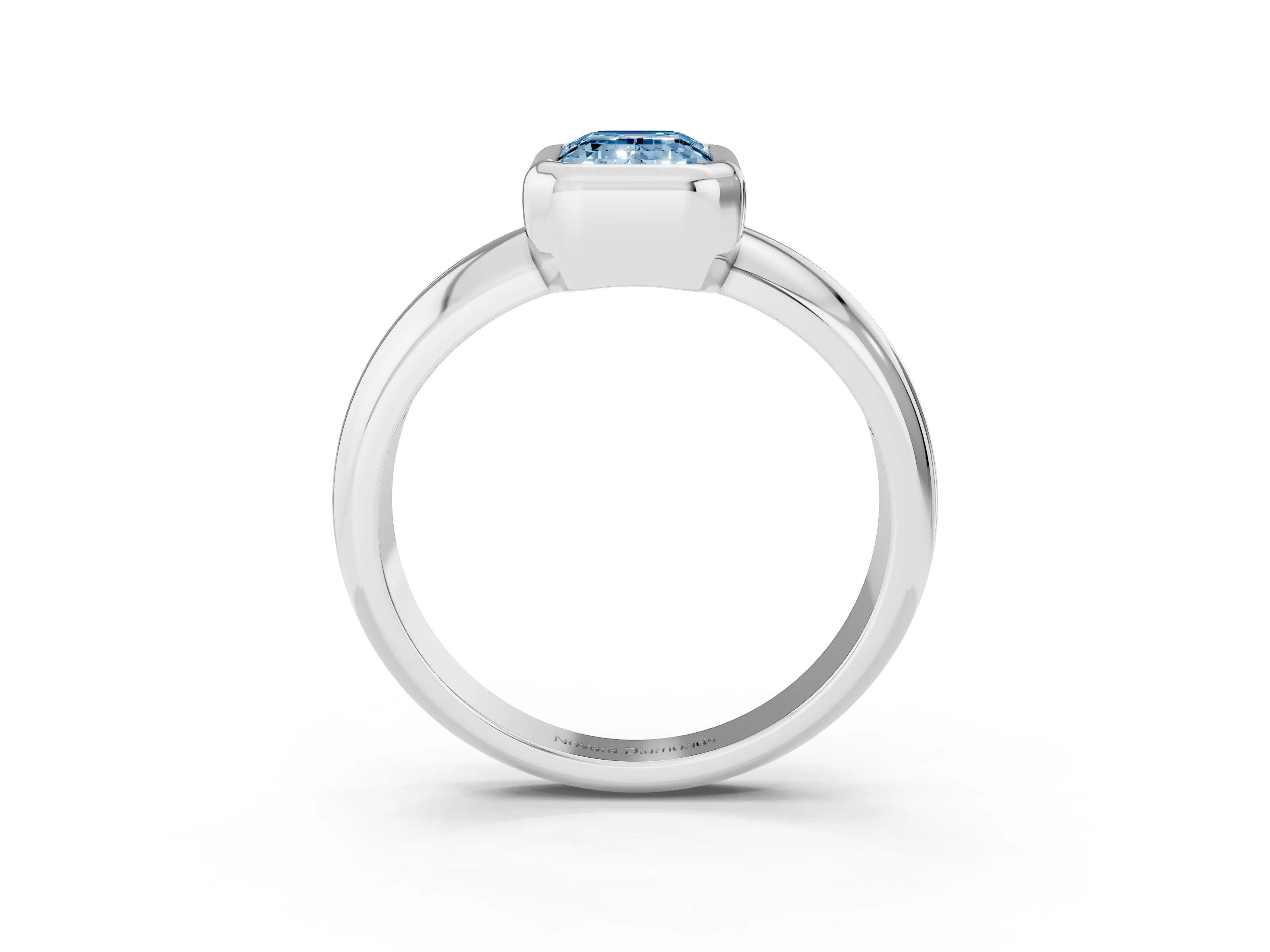 Fancy Blue Bezel Set Emerald Cut Diamond Solitaire Ring Set in White gold with Wide Band