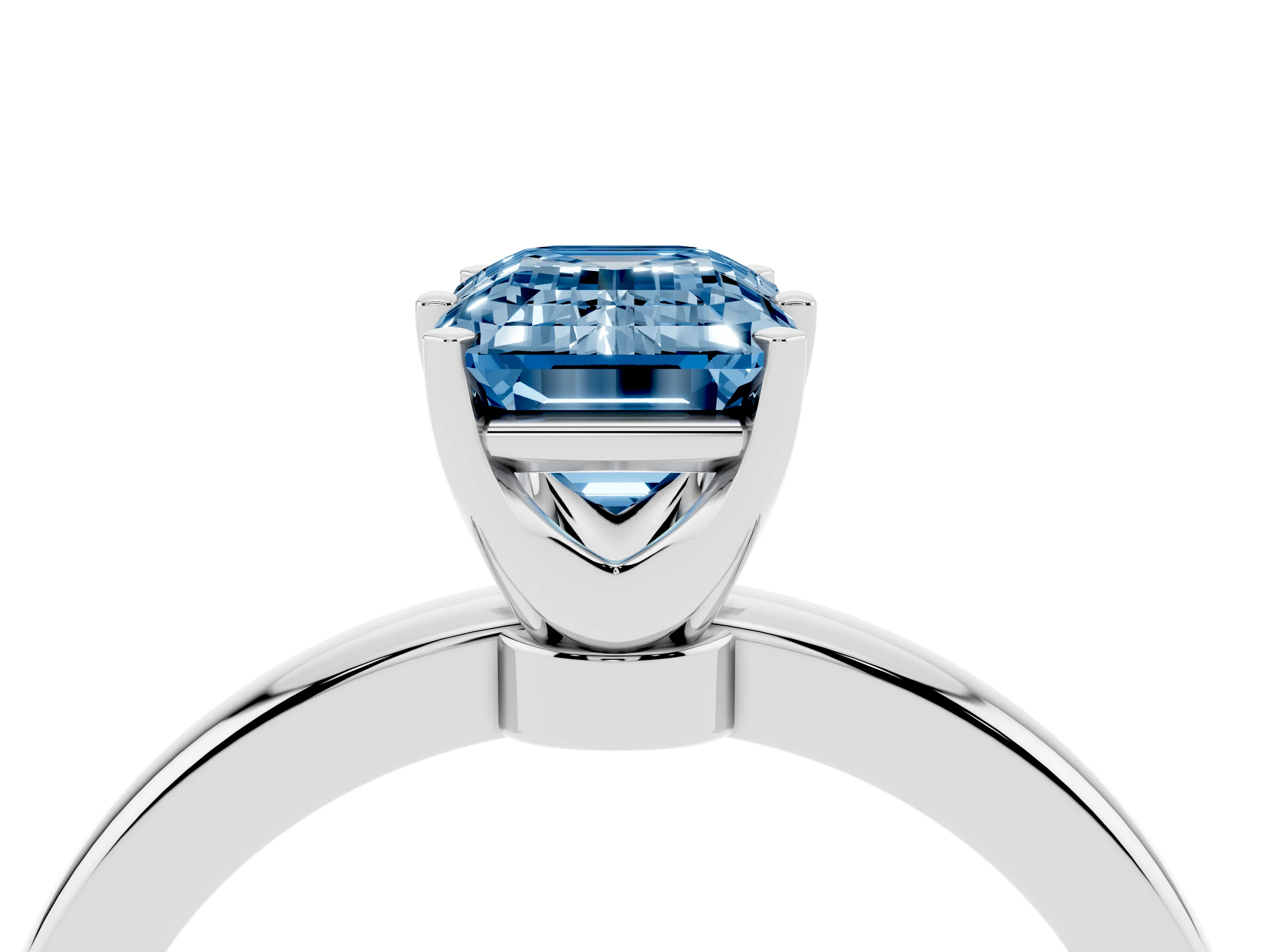 Fancy Blue Emerald Cut Diamond Solitaire Ring Set in Silver with Raised Prong Setting on a Classic Band
