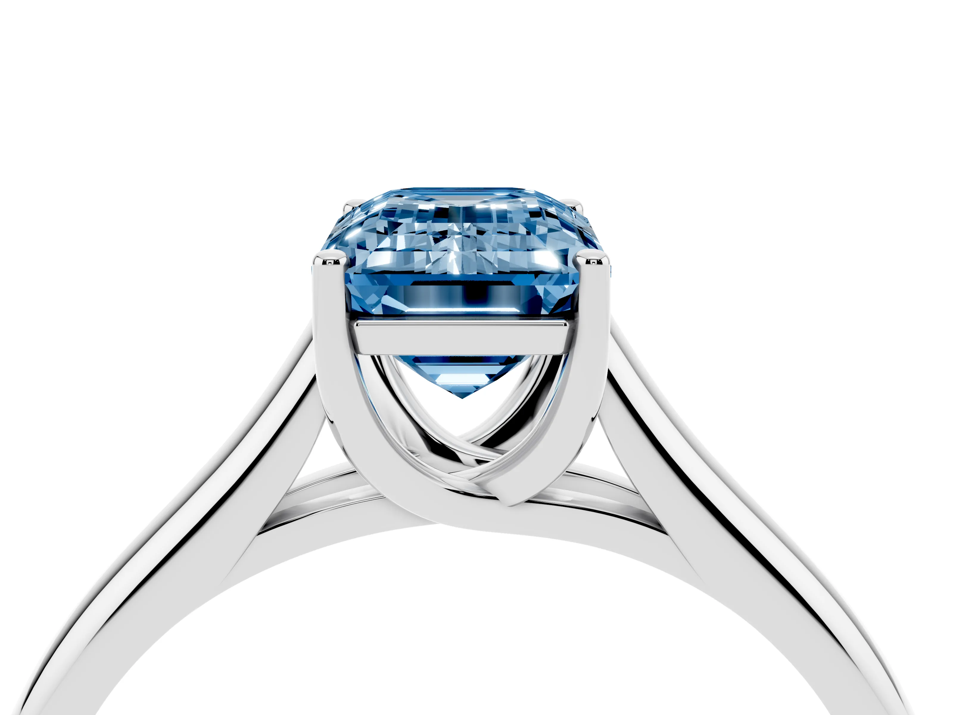 Fancy Blue Emerald Cut Diamond Solitaire Engagement Ring Set in White gold with Subtly Tapered Band and Prong Setting