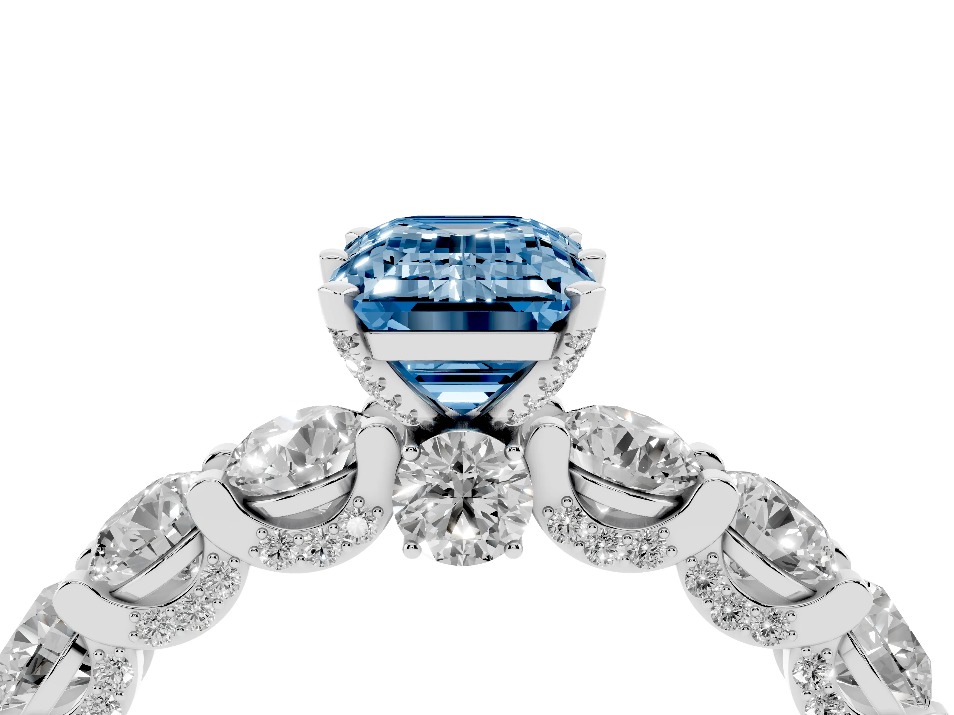 Fancy Blue Emerald Cut Diamond Side Stone Ring Set in White gold with Alternating Round and Oval Side Stones