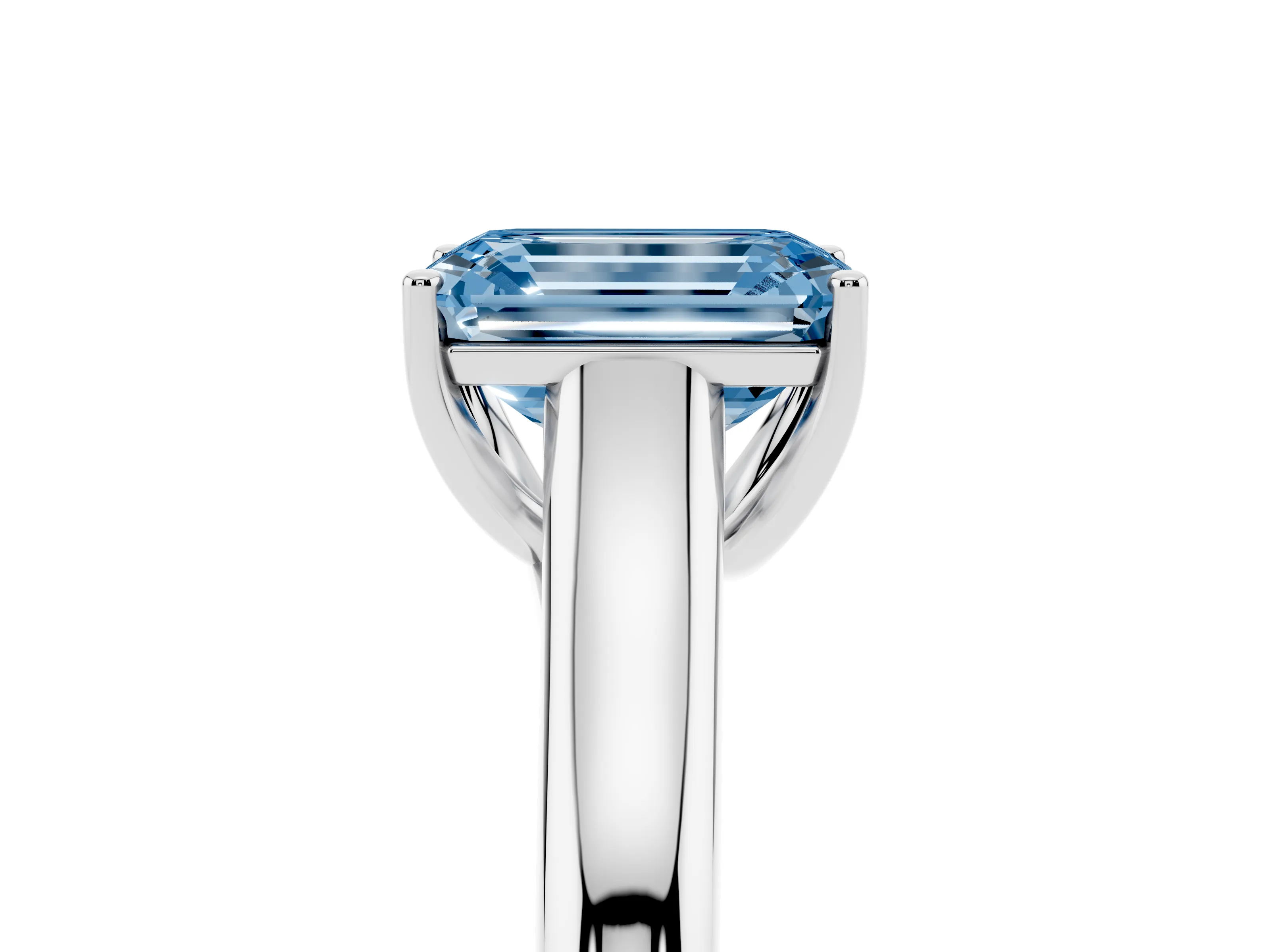 Fancy Blue Emerald Cut Diamond Solitaire Engagement Ring Set in White gold with Subtly Tapered Band and Prong Setting