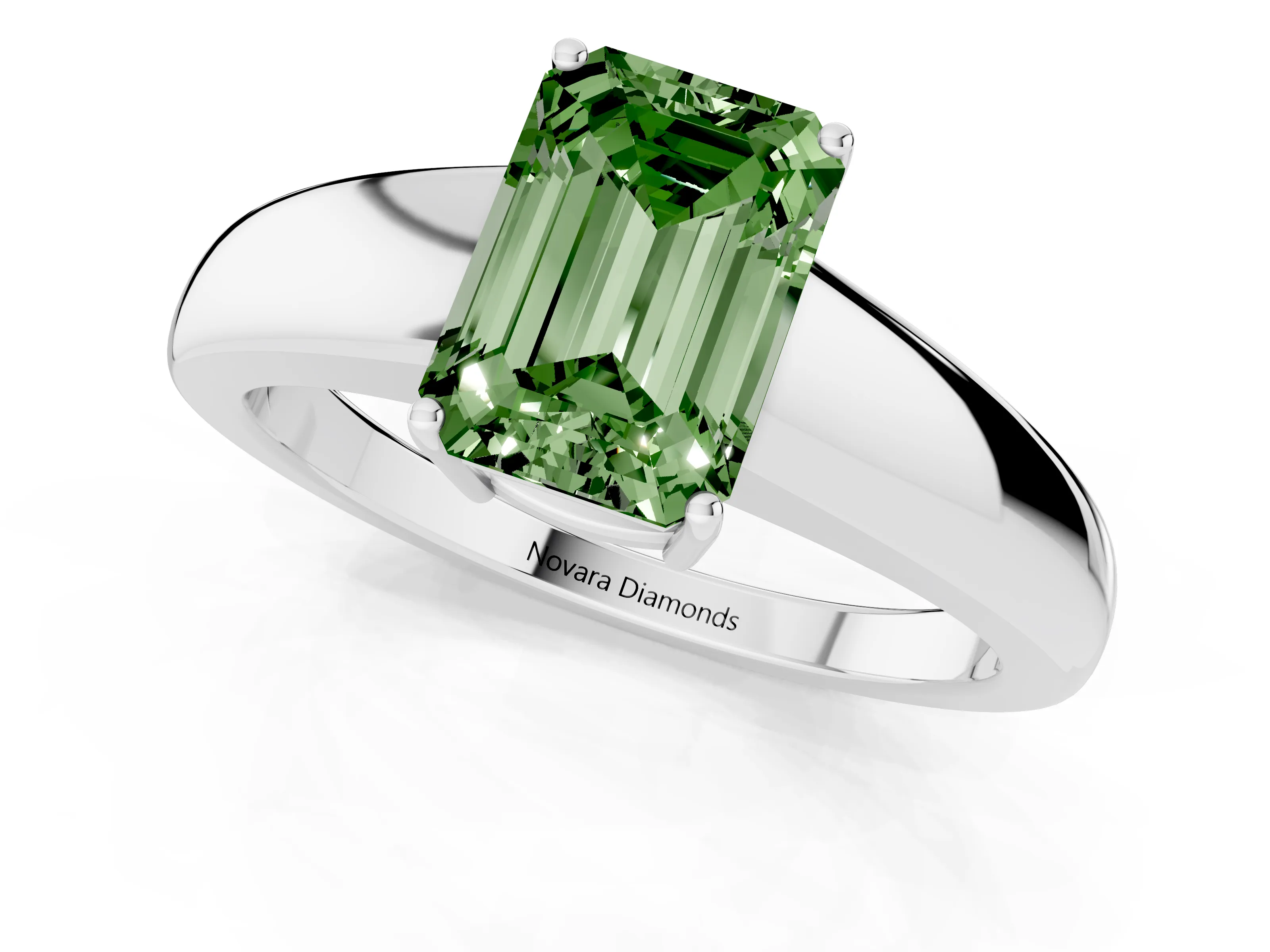 Fancy Green Emerald Cut Diamond Solitaire Ring Set in White gold with Tapered Band and Prong Setting