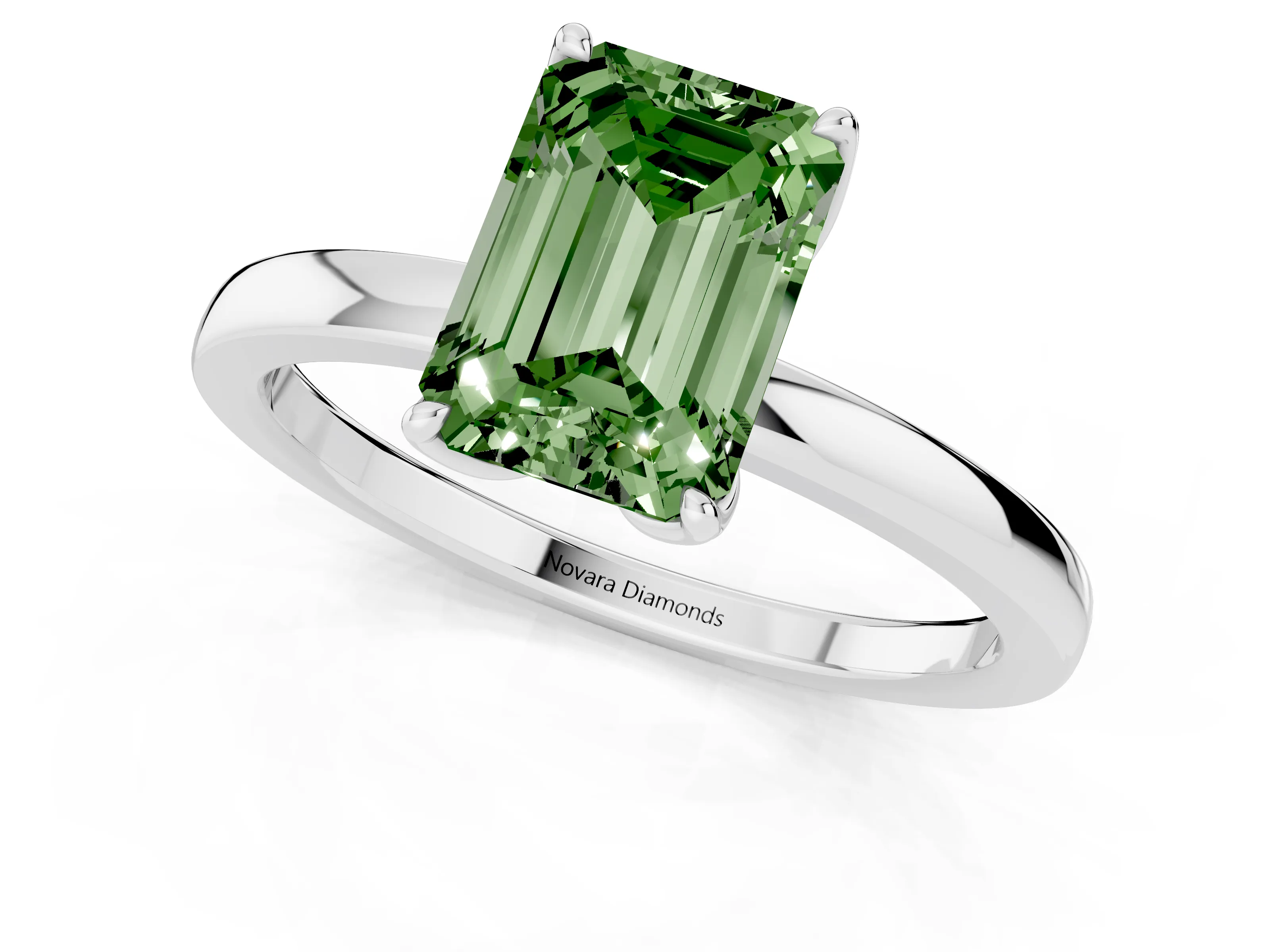 Fancy Green Emerald Cut Diamond Solitaire Ring Set in White gold with Prong Setting and Thin Polished Band