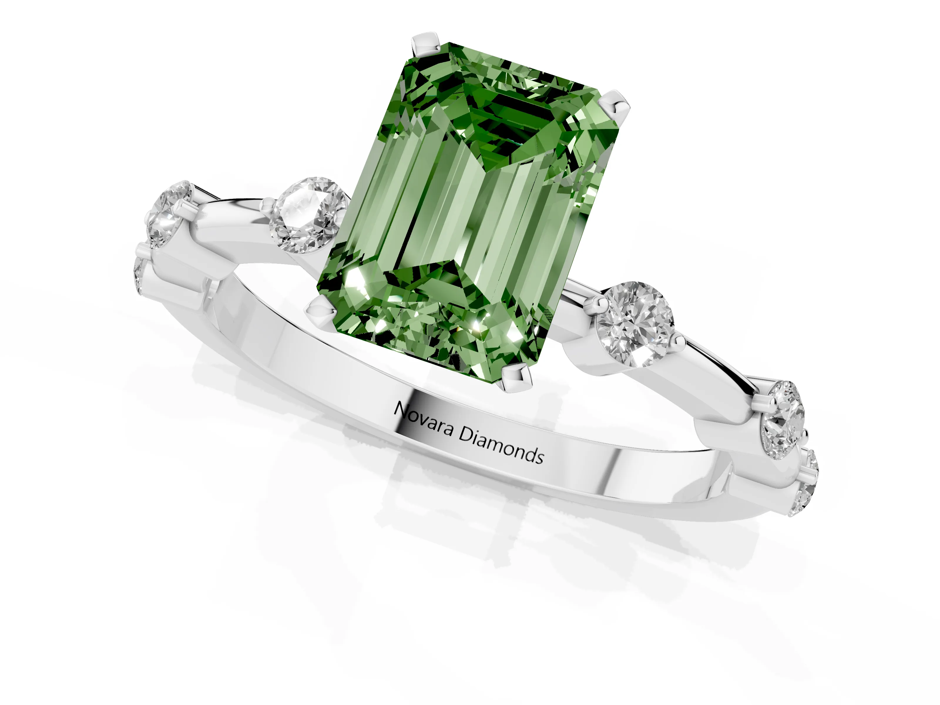 Fancy Green Emerald Cut Diamond Solitaire Ring Set in White gold with Bezel Set Side Stones and Prong Setting