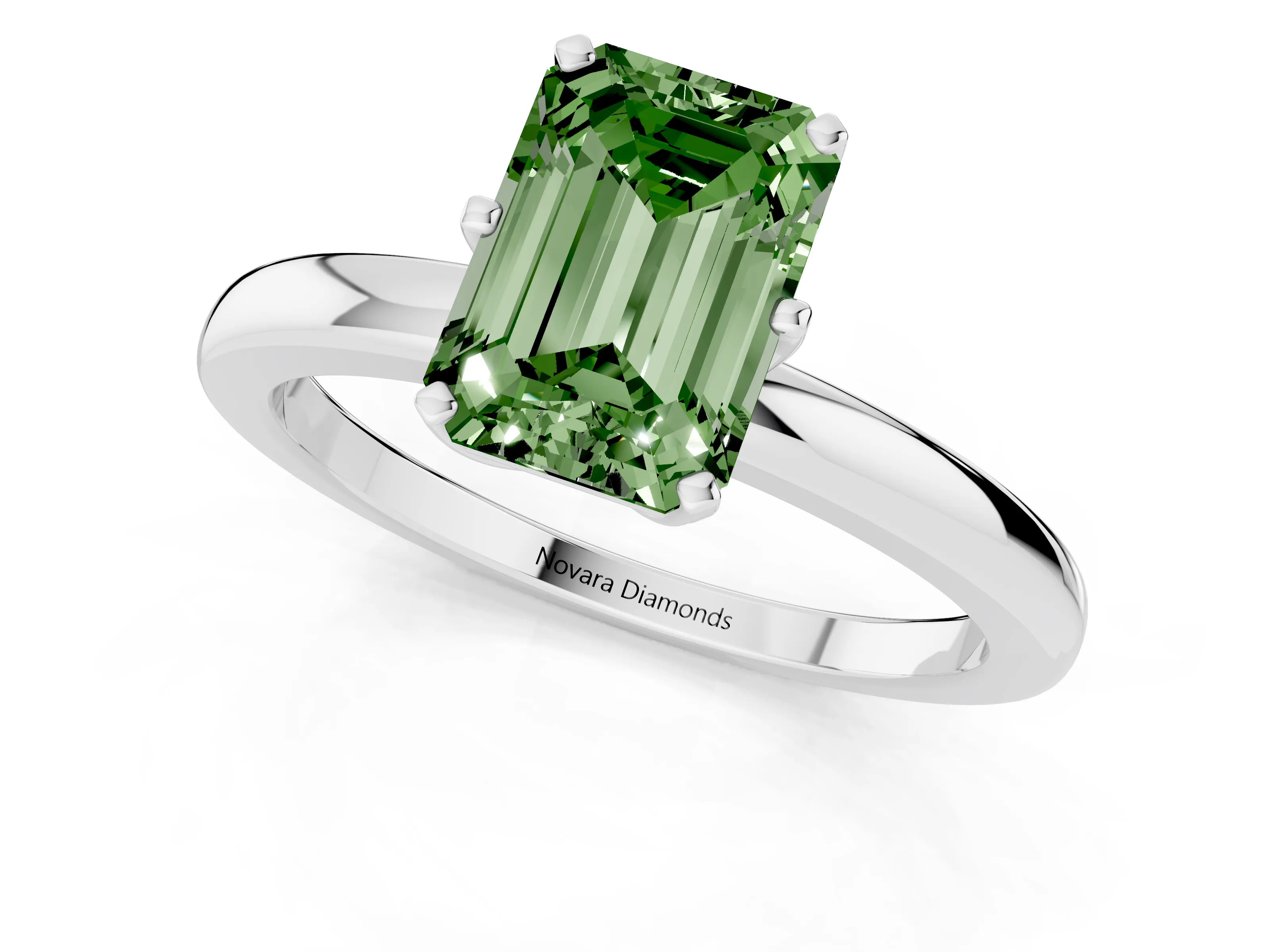 Fancy Green Emerald Cut Diamond Solitaire Ring Set in Silver with Raised Prong Setting on a Classic Band