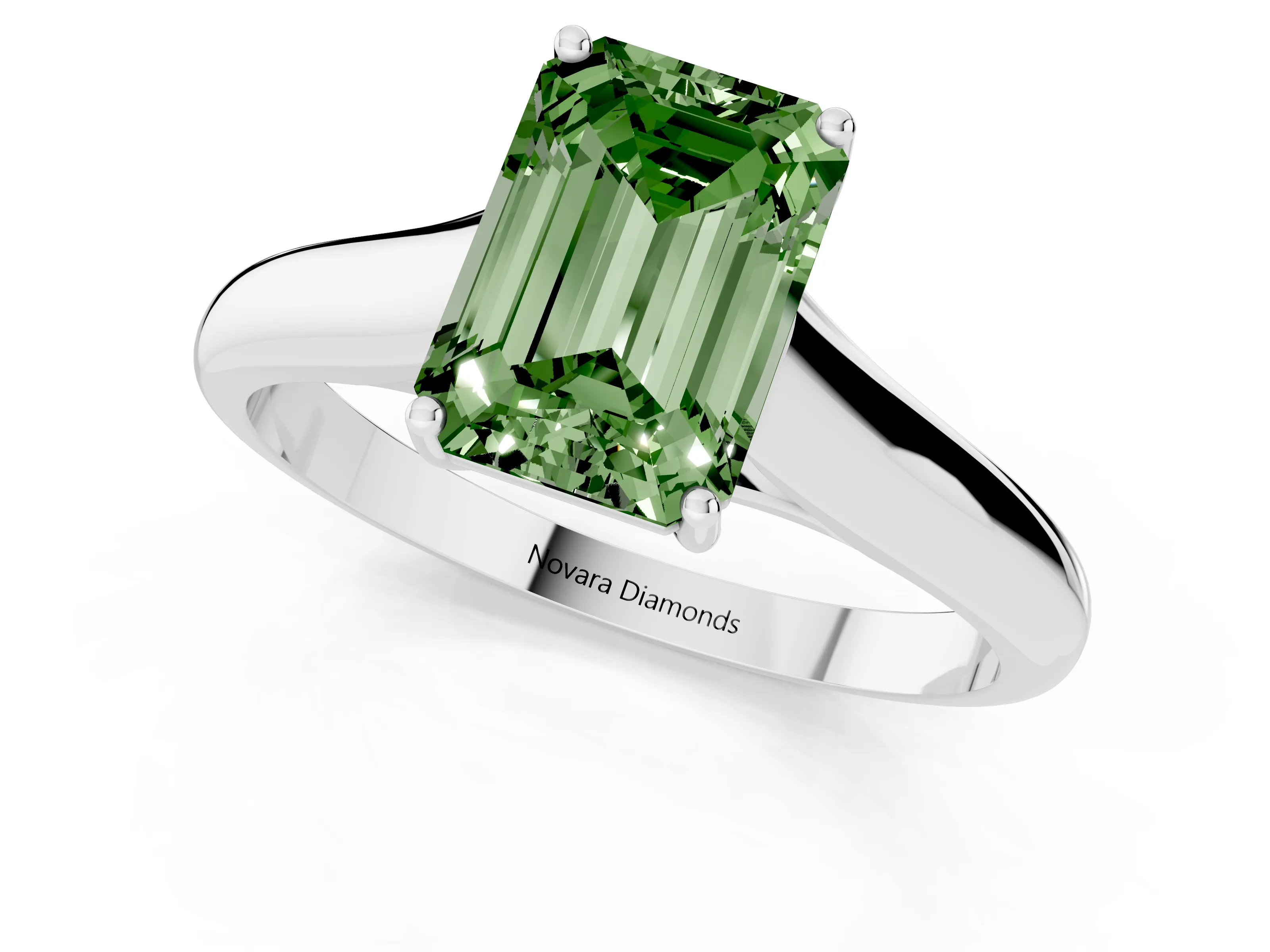 Fancy Green Emerald Cut Diamond Solitaire Engagement Ring Set in White gold with Subtly Tapered Band and Prong Setting