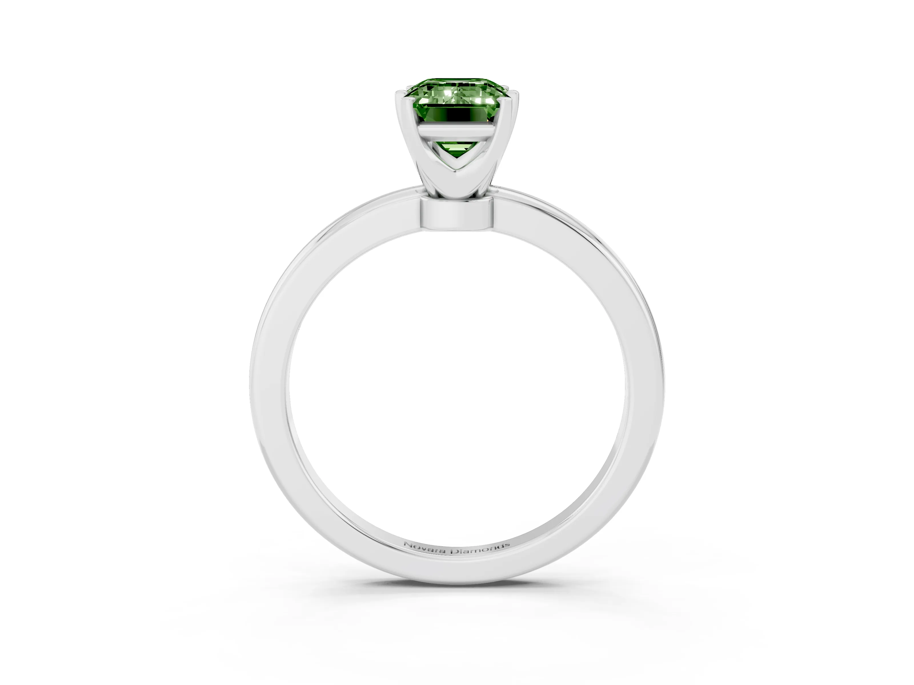 Fancy Green Emerald Cut Diamond Solitaire Ring Set in Silver with Raised Prong Setting on a Classic Band