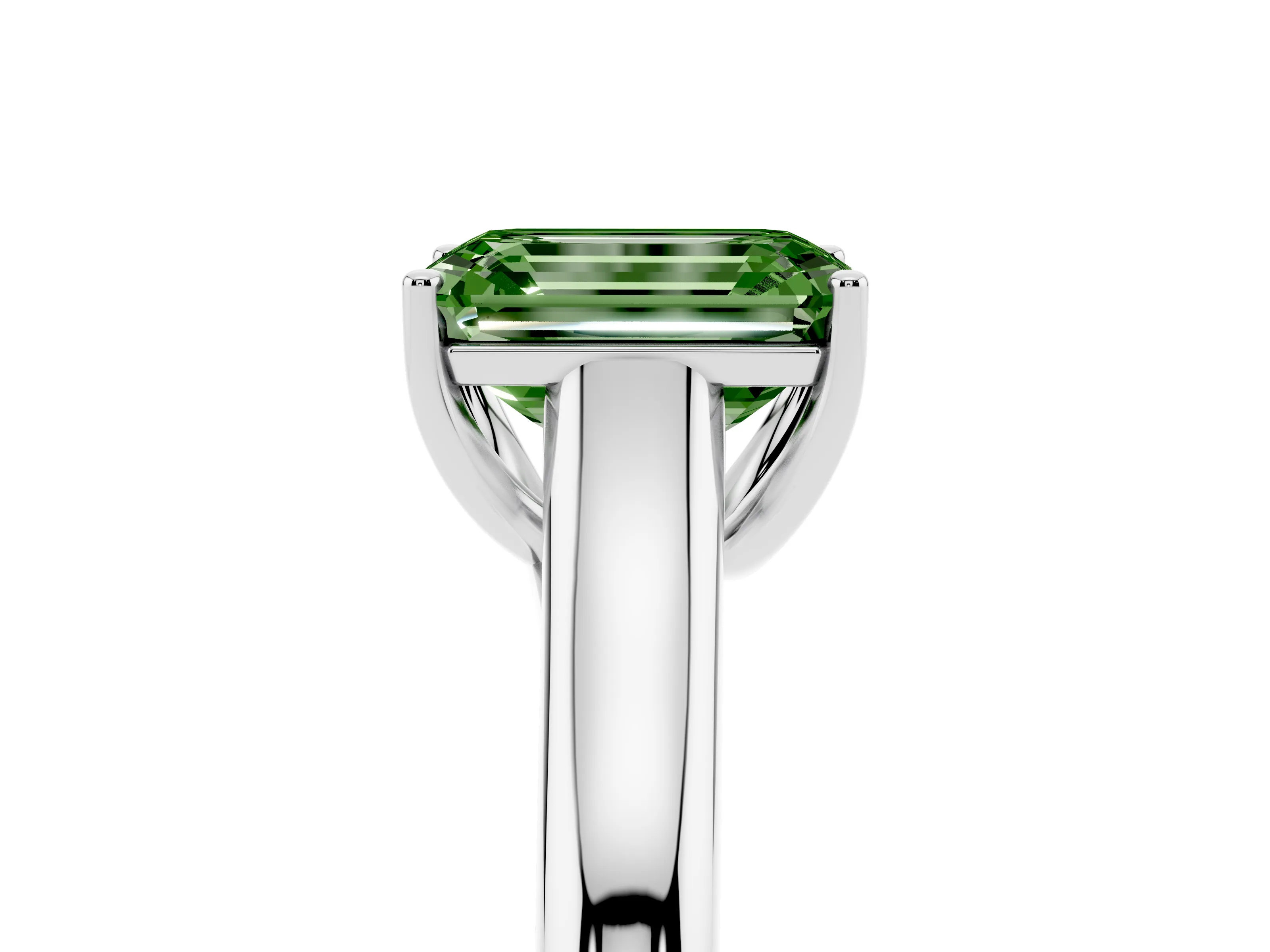 Fancy Green Emerald Cut Diamond Solitaire Engagement Ring Set in White gold with Subtly Tapered Band and Prong Setting