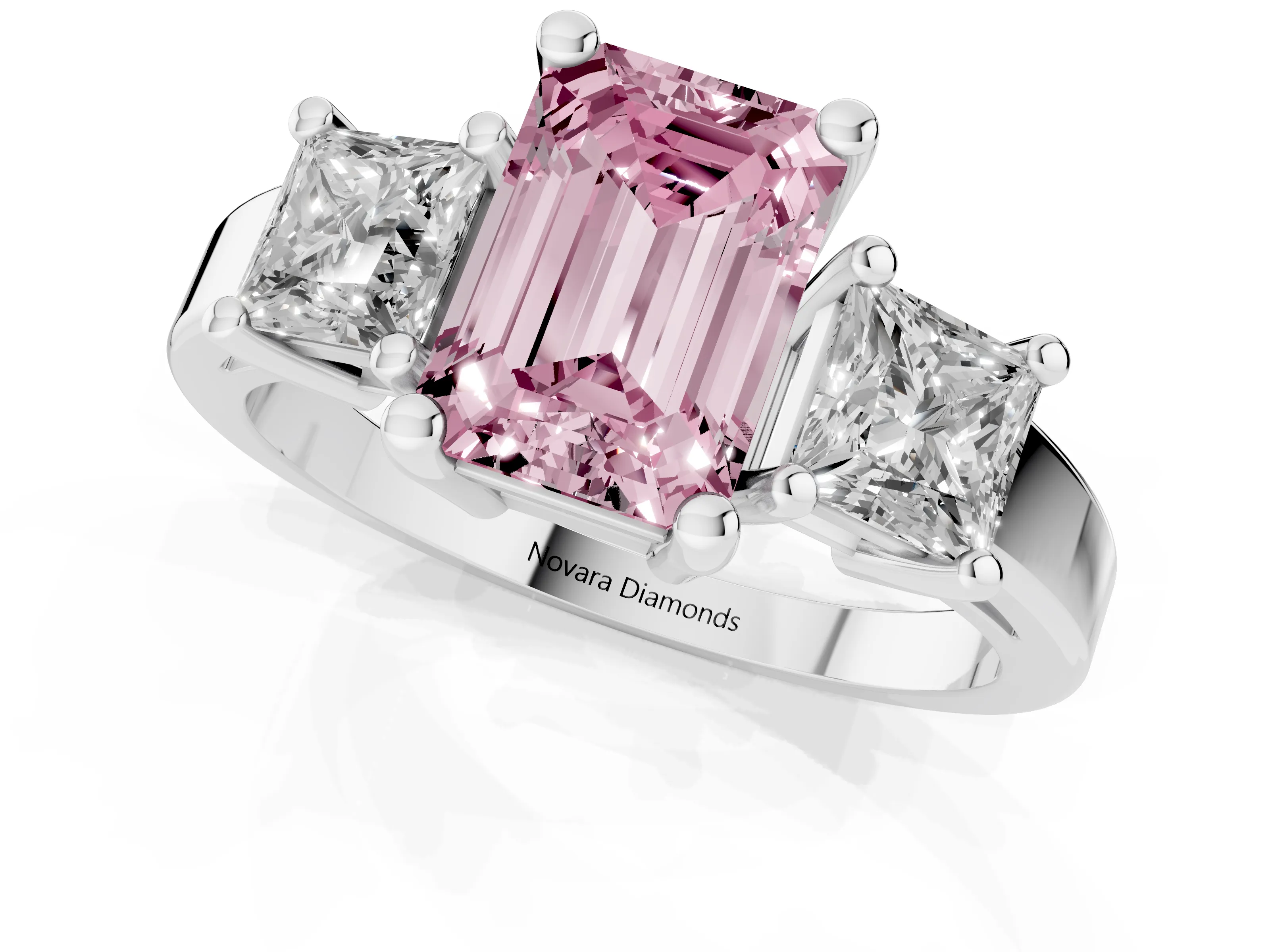 Fancy Pink Three-Stone Emerald Cut Diamond Solitaire Ring Set in Platinum with Prong Setting
