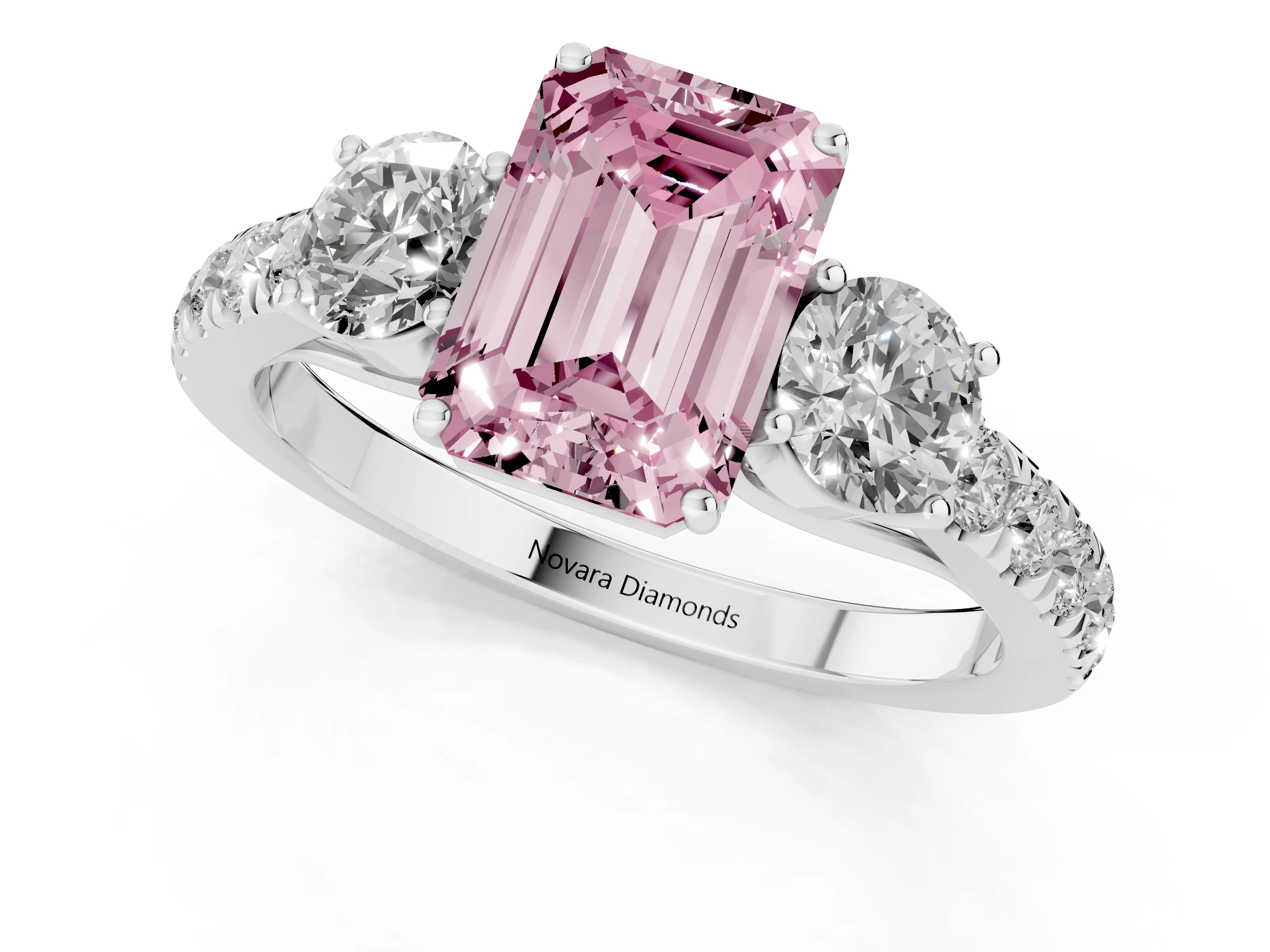 Fancy Pink Emerald Cut Diamond Three-Stone Ring Set in White gold with Round Side Stones and Delicate Pavé Band