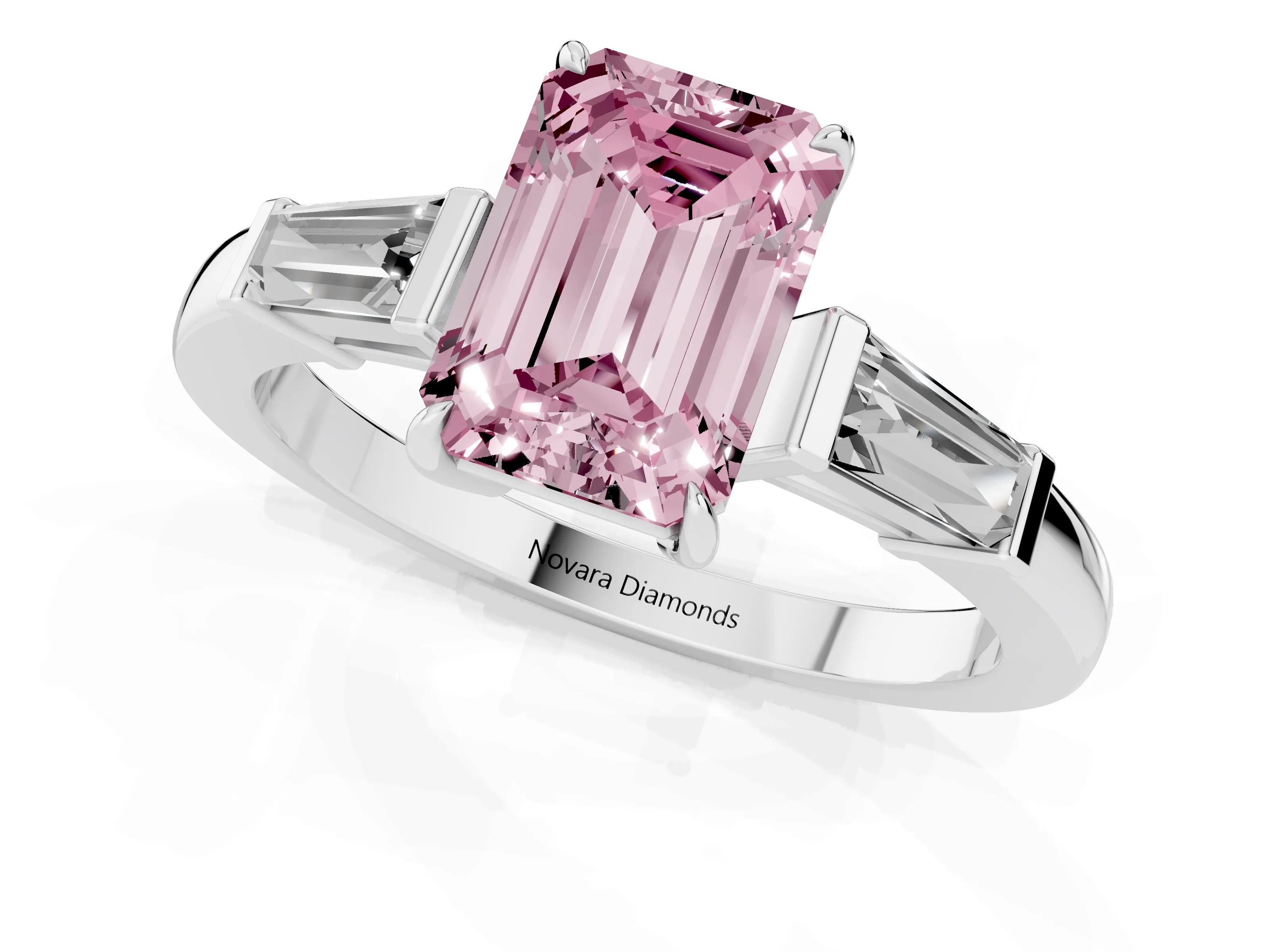 Fancy Pink Emerald Cut Diamond Three-Stone Ring Set in Platinum with Tapered Baguette Side Stones and Prong Setting
