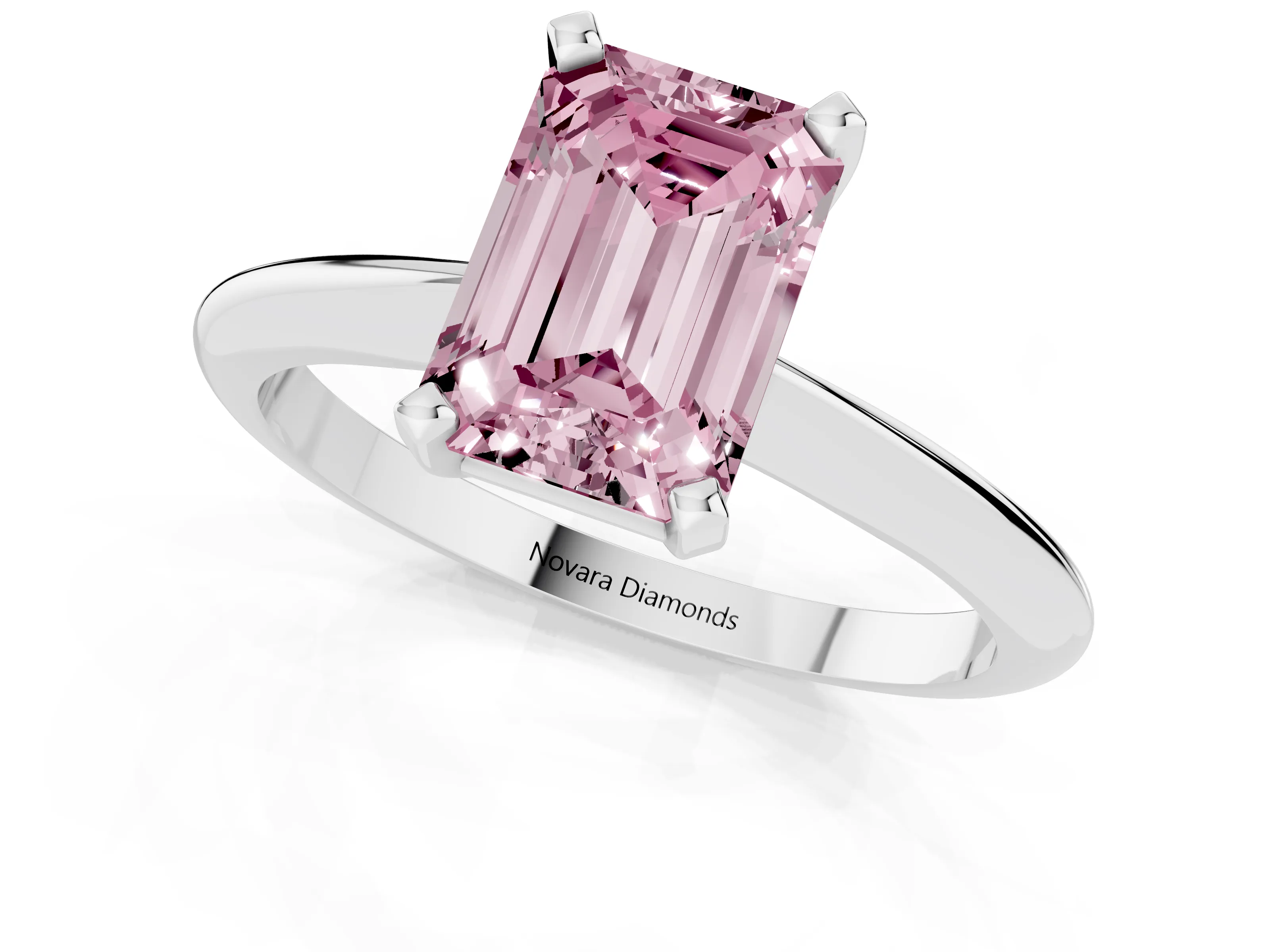Fancy Pink Emerald Cut Diamond Solitaire Ring Set in Silver with Prong Setting on a Plain Round Band
