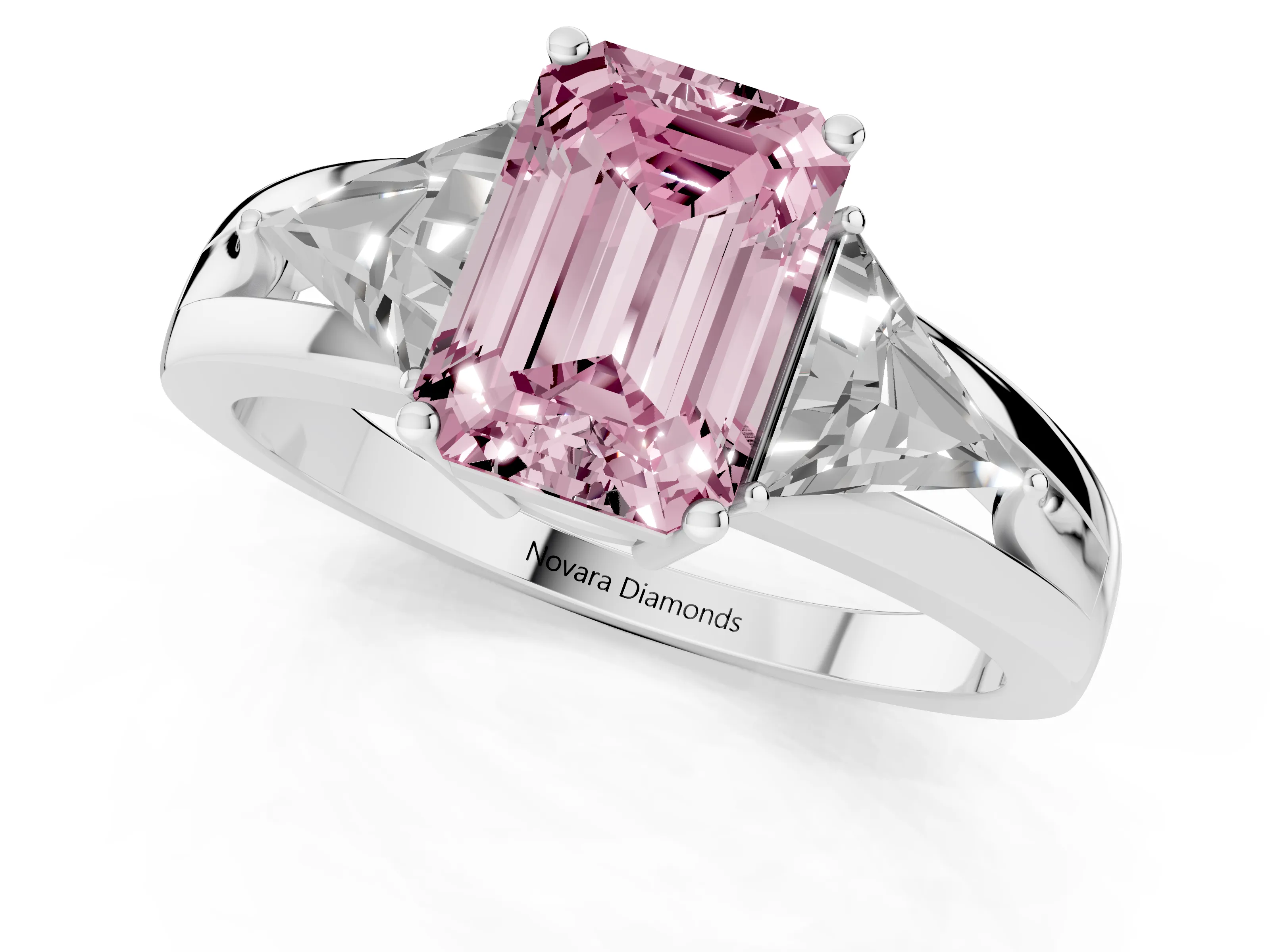 Fancy Pink Emerald Cut Diamond Three-Stone Ring Set in White gold with Trillion Side Stones and Split Shank