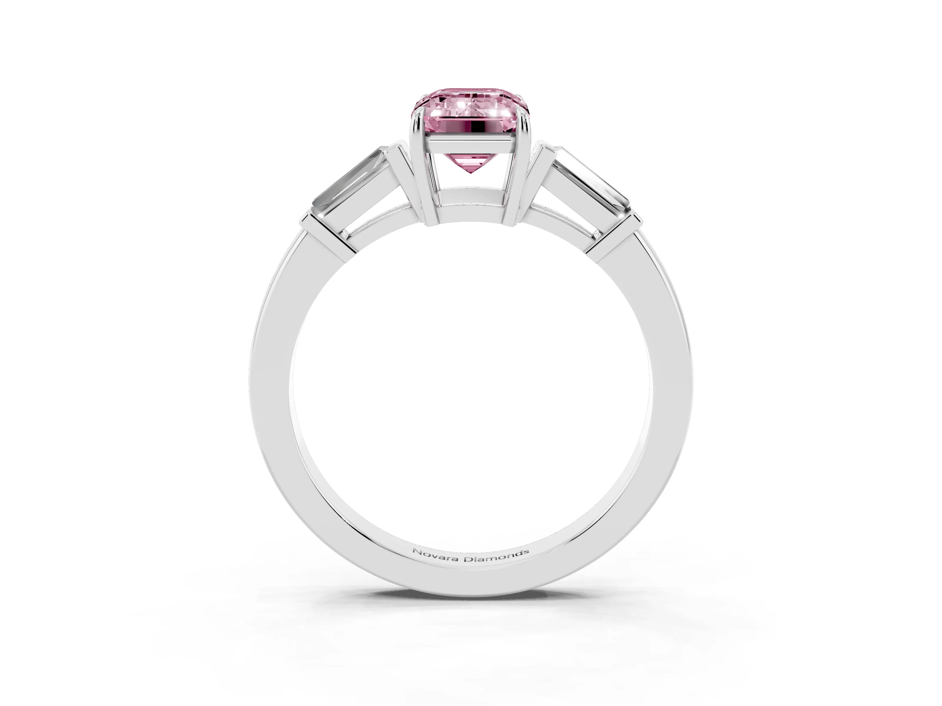 Fancy Pink Emerald Cut Diamond Three-Stone Ring Set in Platinum with Tapered Baguette Side Stones and Prong Setting