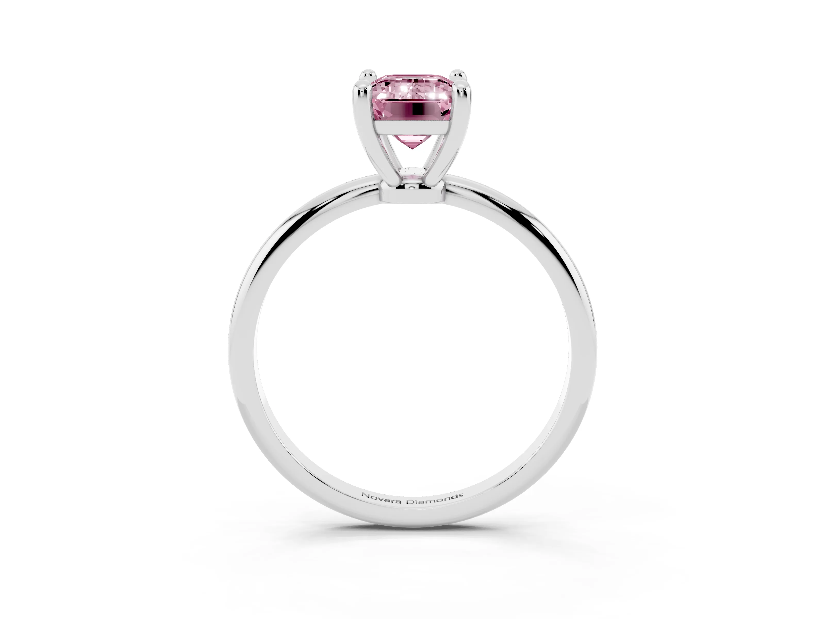 Fancy Pink Emerald Cut Diamond Solitaire Ring Set in White gold with Secure Prong Setting on a Classic Band