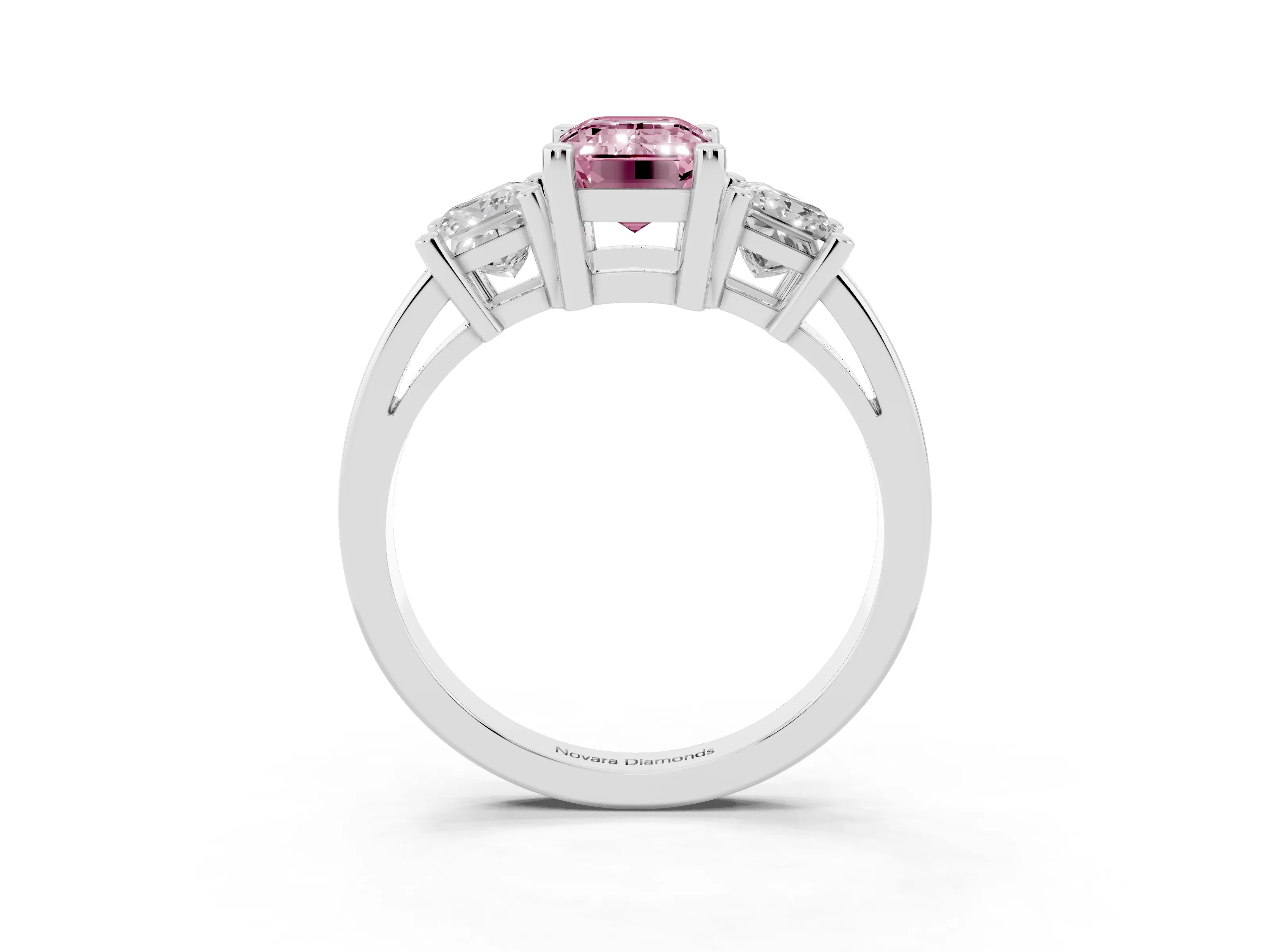 Fancy Pink Three-Stone Emerald Cut Diamond Solitaire Ring Set in Platinum with Prong Setting