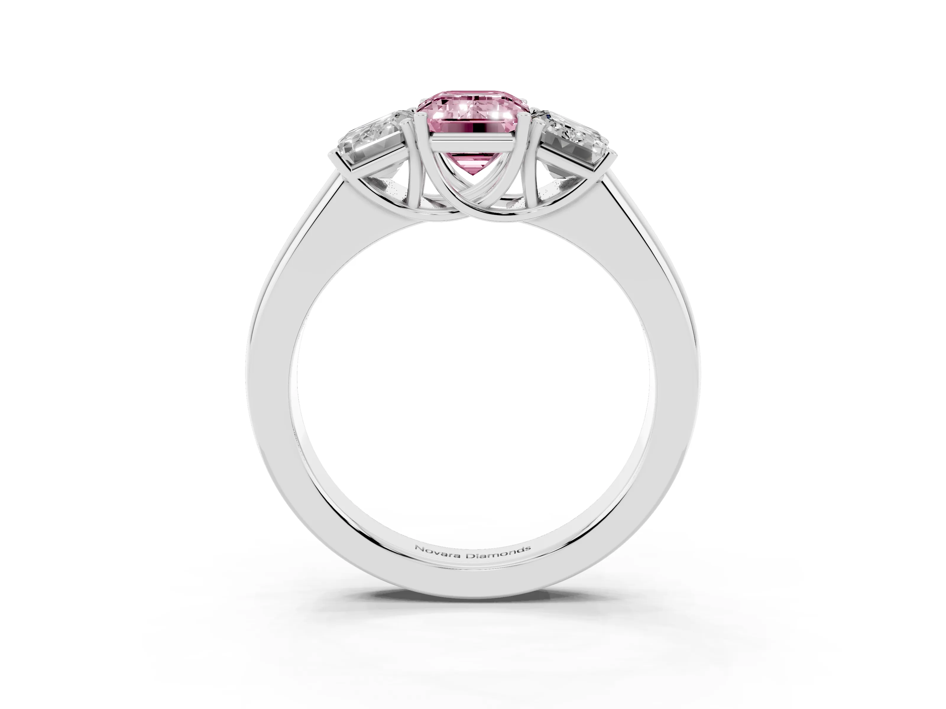 Fancy Pink Three-Stone Emerald Cut Diamond Ring Set in White gold with Matching Prong Settings and Plain Band