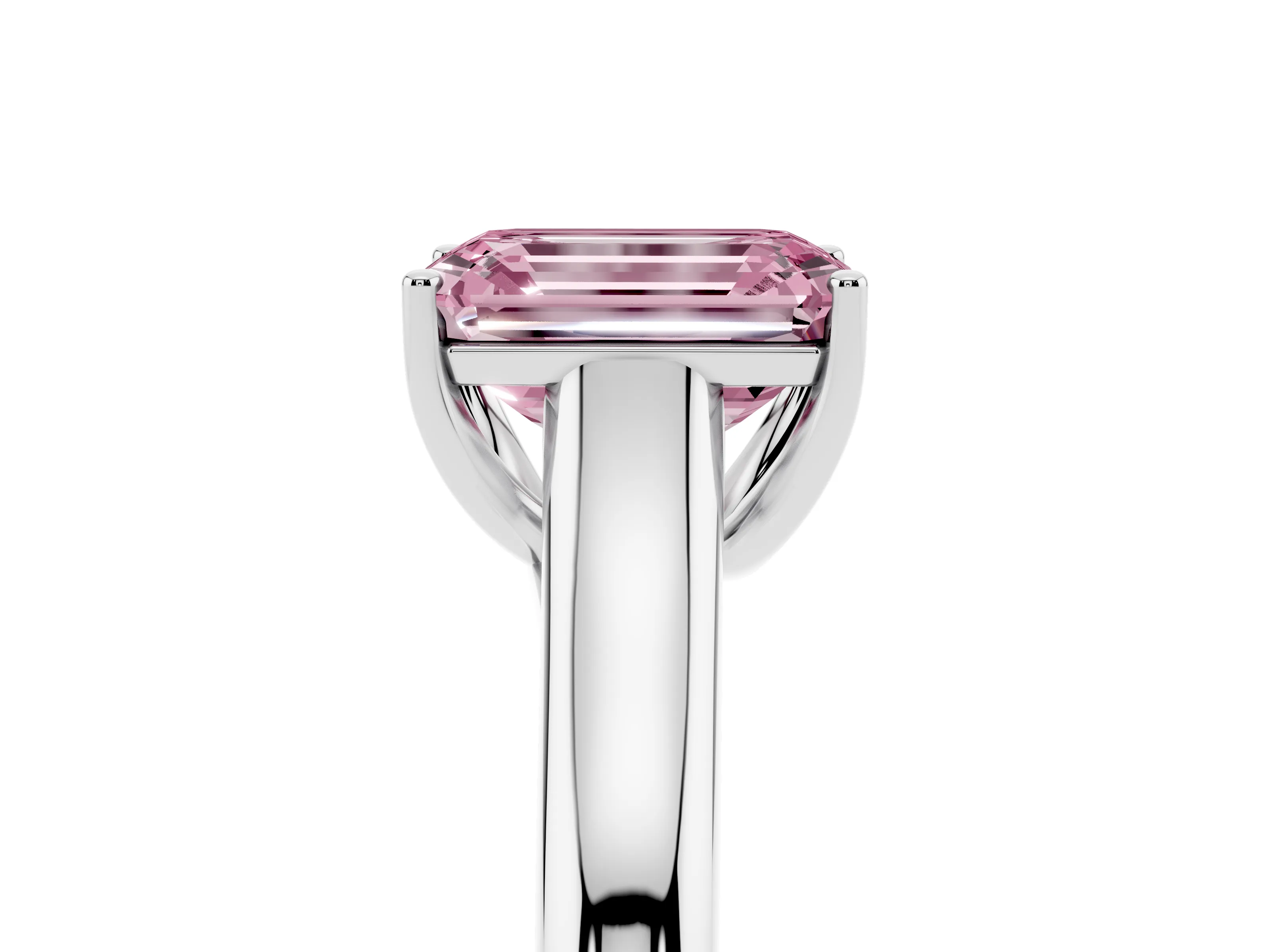 Fancy Pink Emerald Cut Diamond Solitaire Engagement Ring Set in White gold with Subtly Tapered Band and Prong Setting