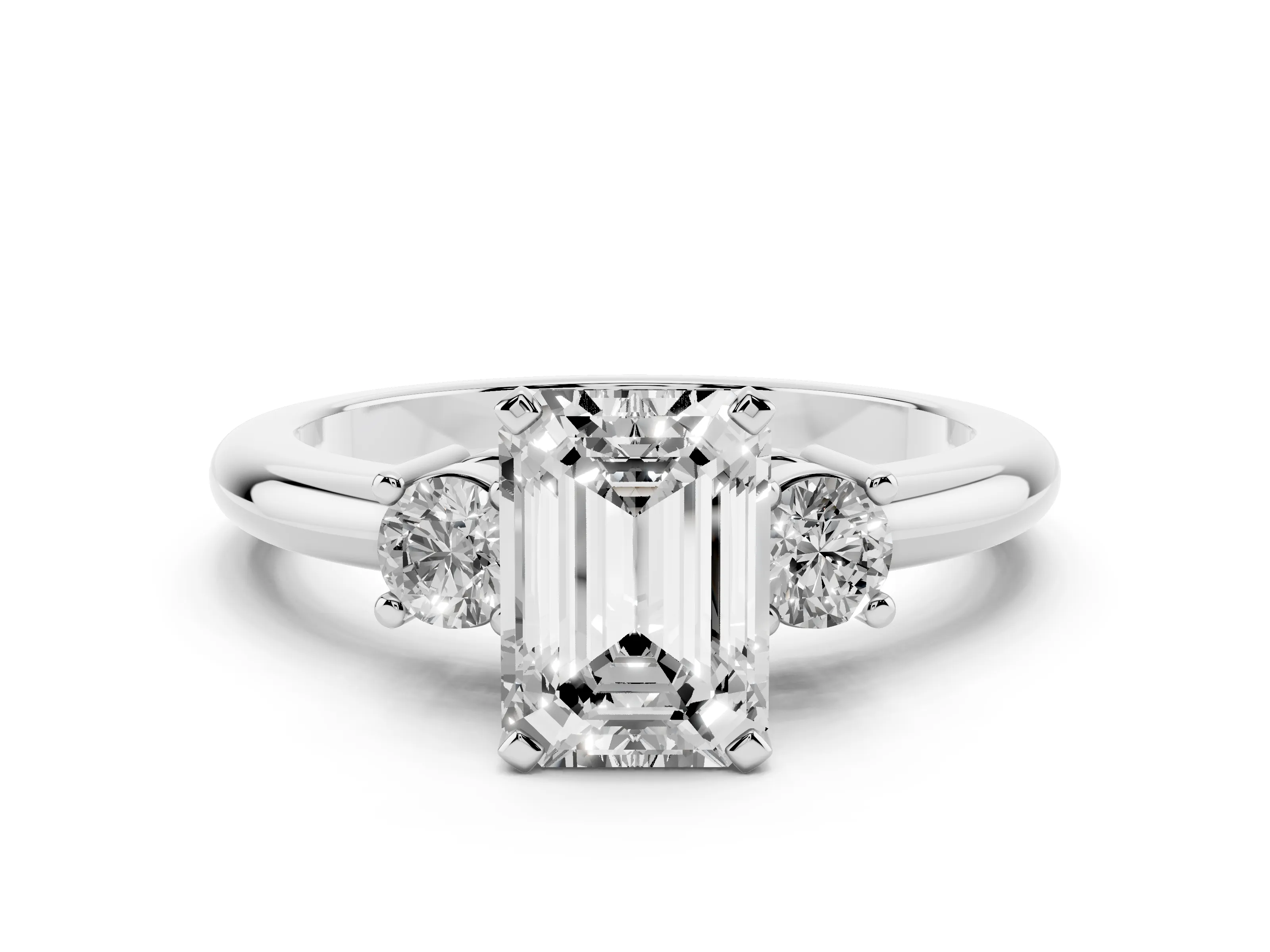 Three-Stone Emerald Cut Diamond Ring Set in Platinum with Prong Setting and Plain Band