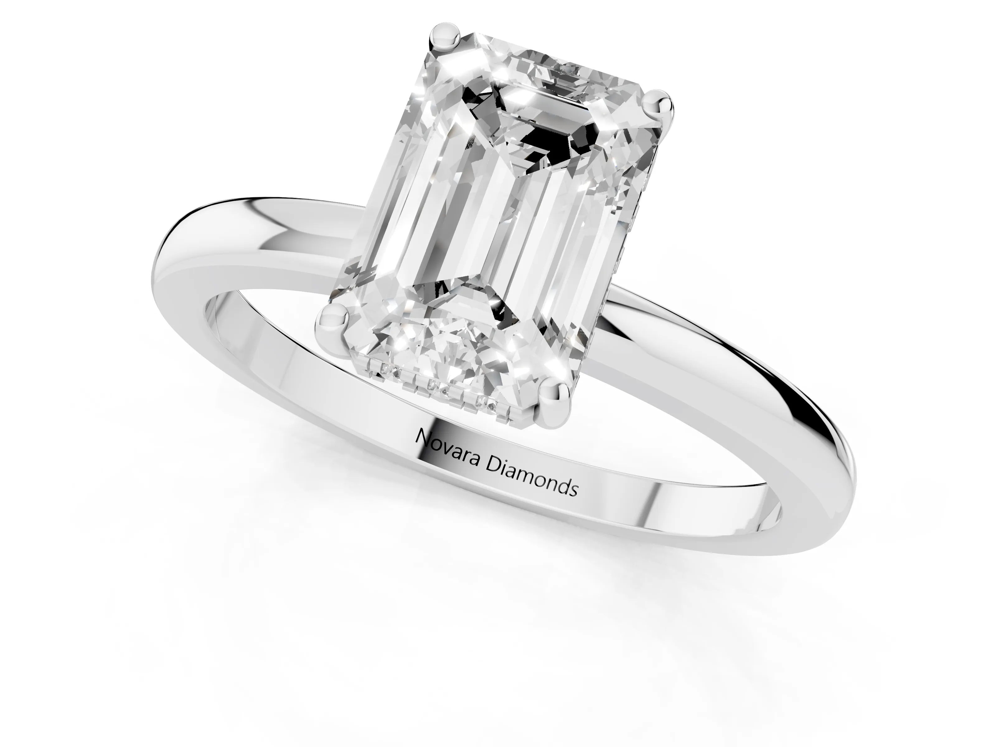 Emerald Cut Diamond Solitaire Ring Set in Platinum with Plain Band and Prong Setting