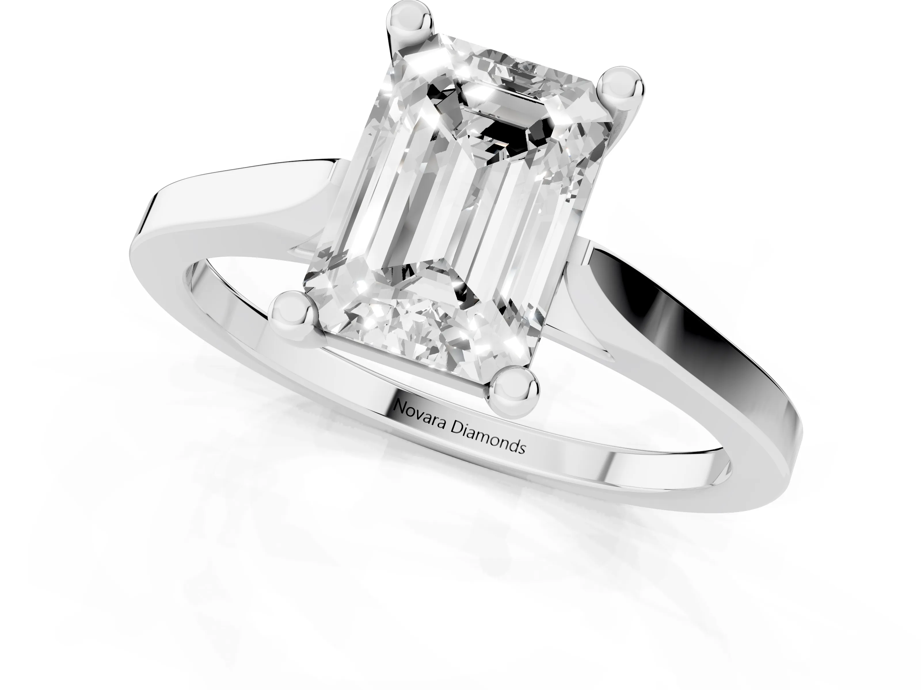 Emerald Cut Diamond Solitaire Ring Set in Platinum with Prong Setting and Tapered Band