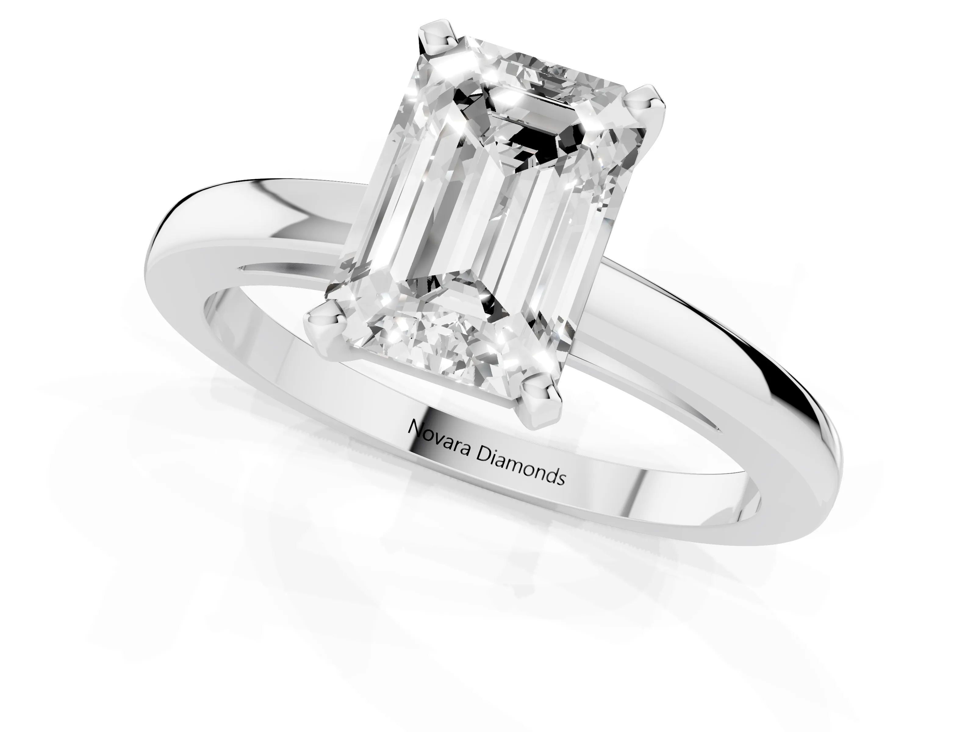 Emerald Cut Diamond Solitaire Engagement Ring Set in Platinum with Prong Setting on a Classic Band