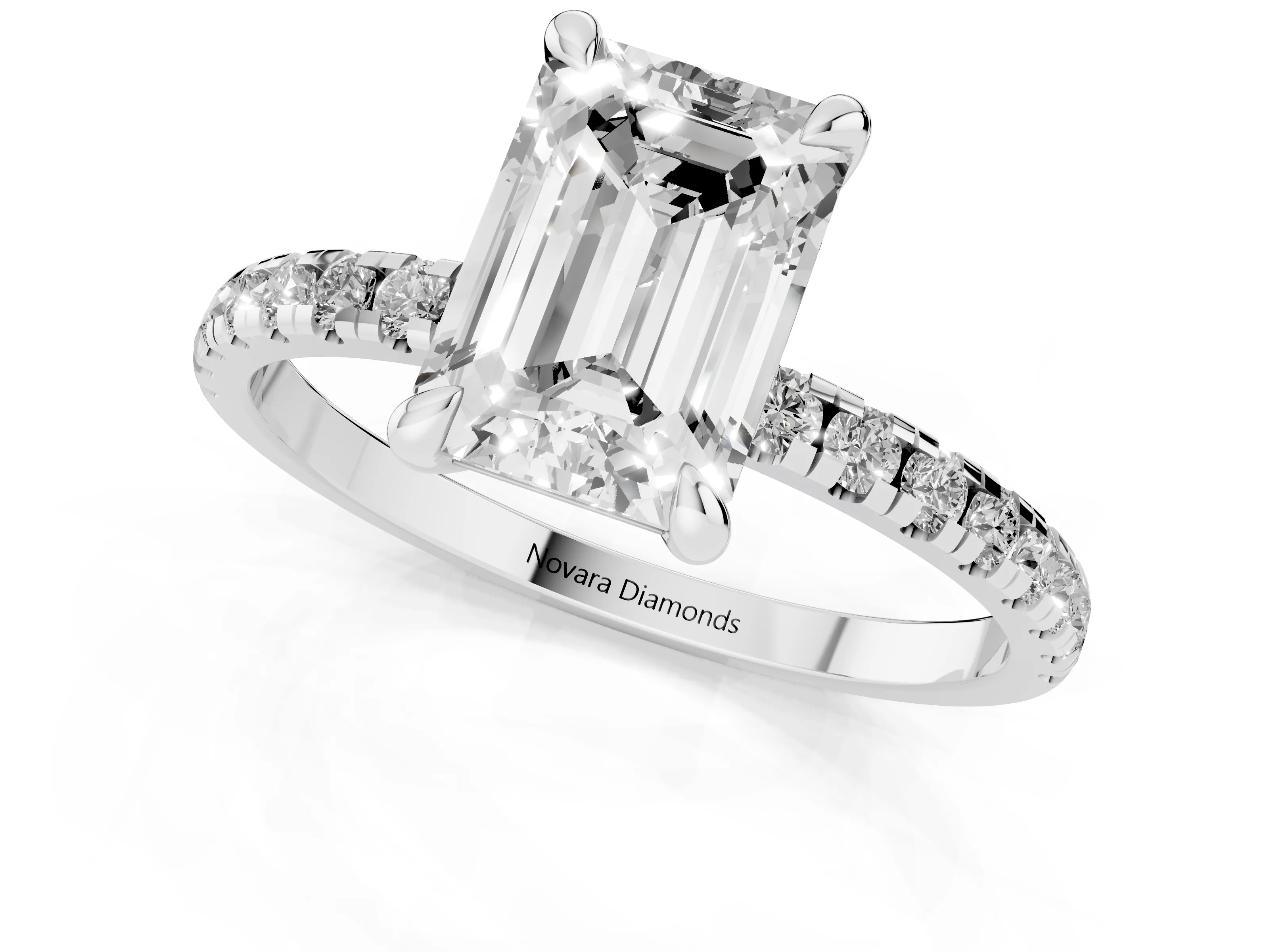 Emerald Cut Diamond Brilliant Solitaire Ring Set in White gold with Pavé Band and Prong Setting