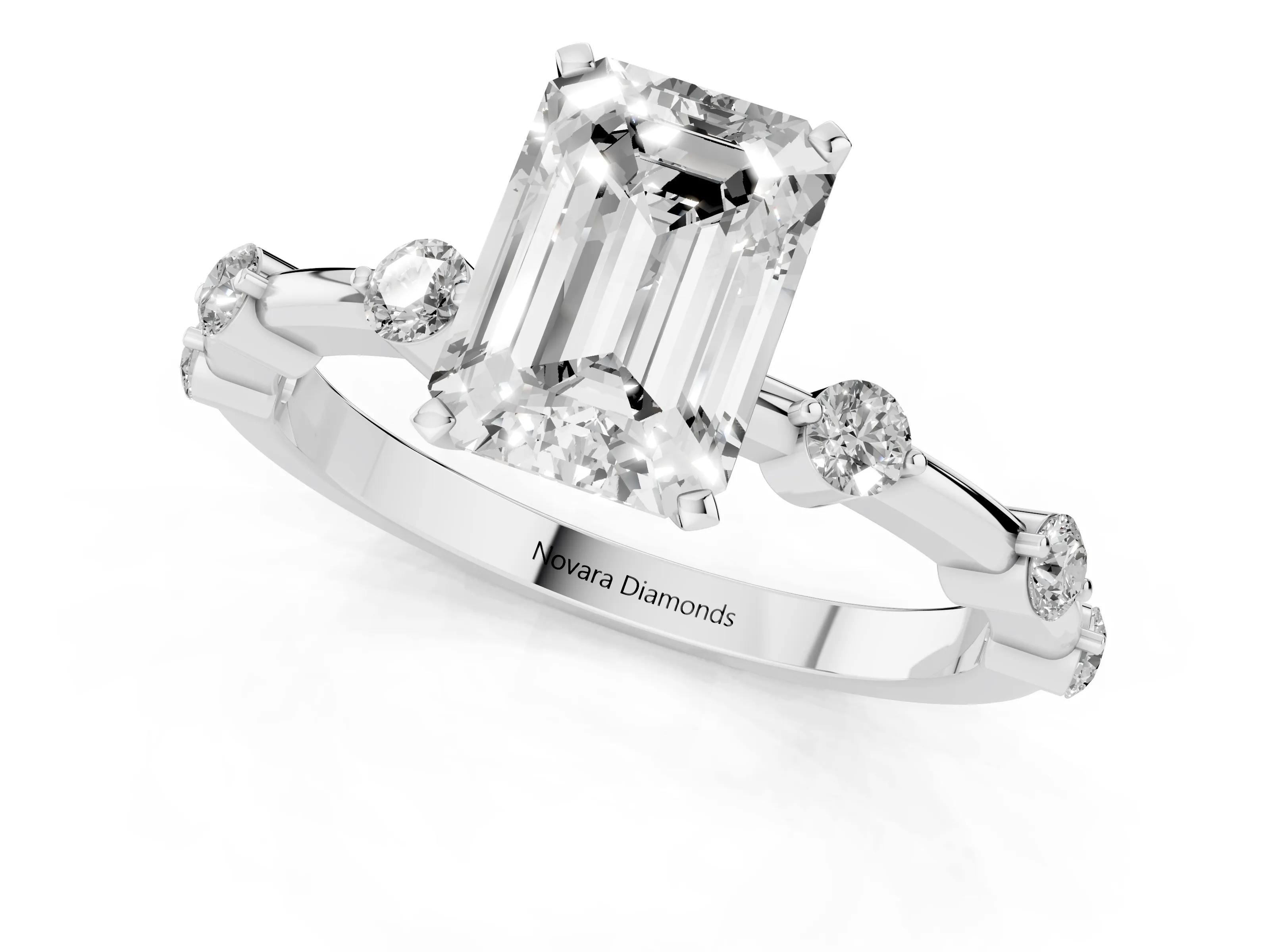 Emerald Cut Diamond Solitaire Ring Set in Silver with Bezel Set Side Stones and Prong Setting