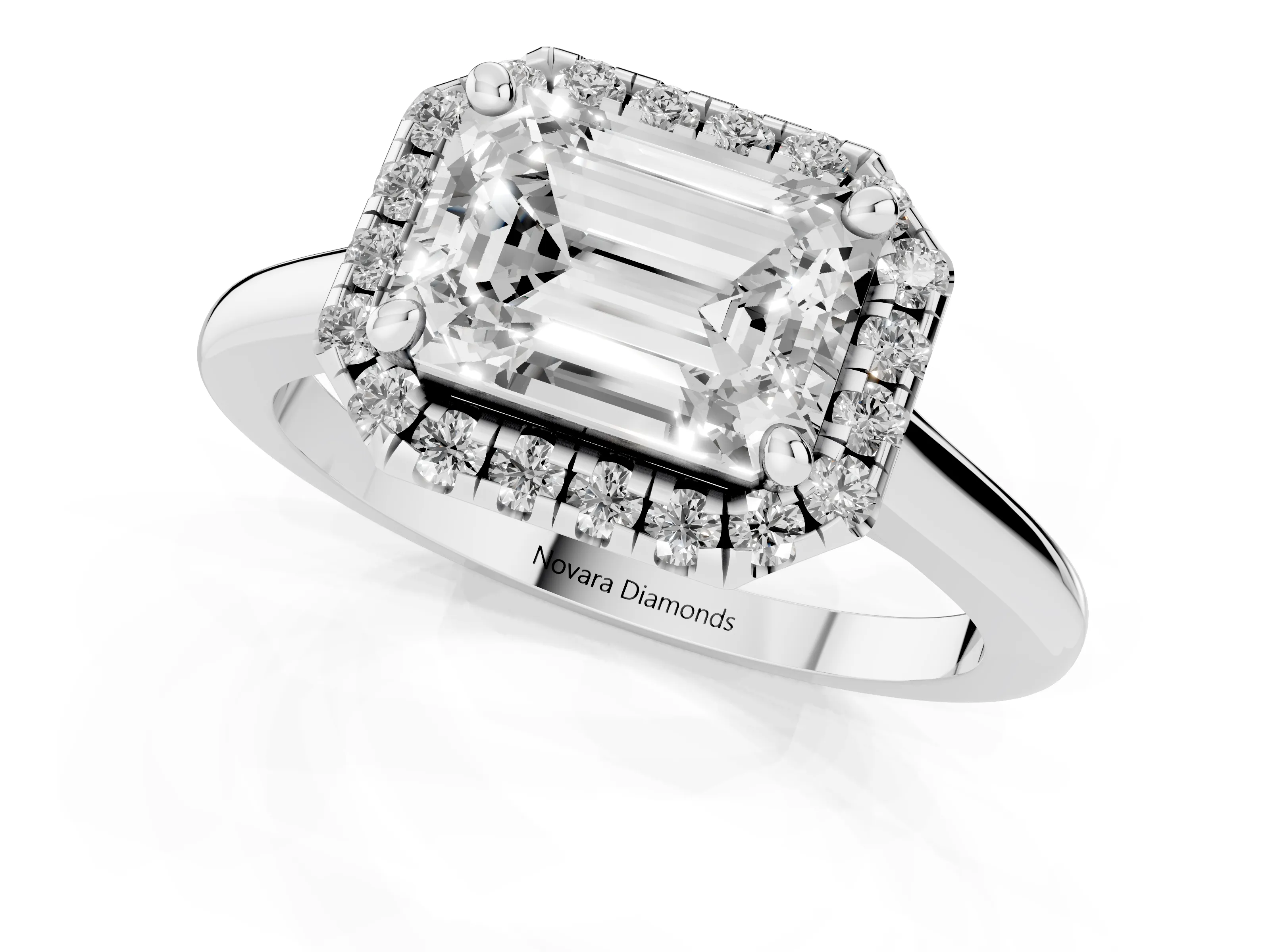 Emerald Cut Diamond Halo Engagement Ring Set in White gold with Pavé Band and Rising Shoulders