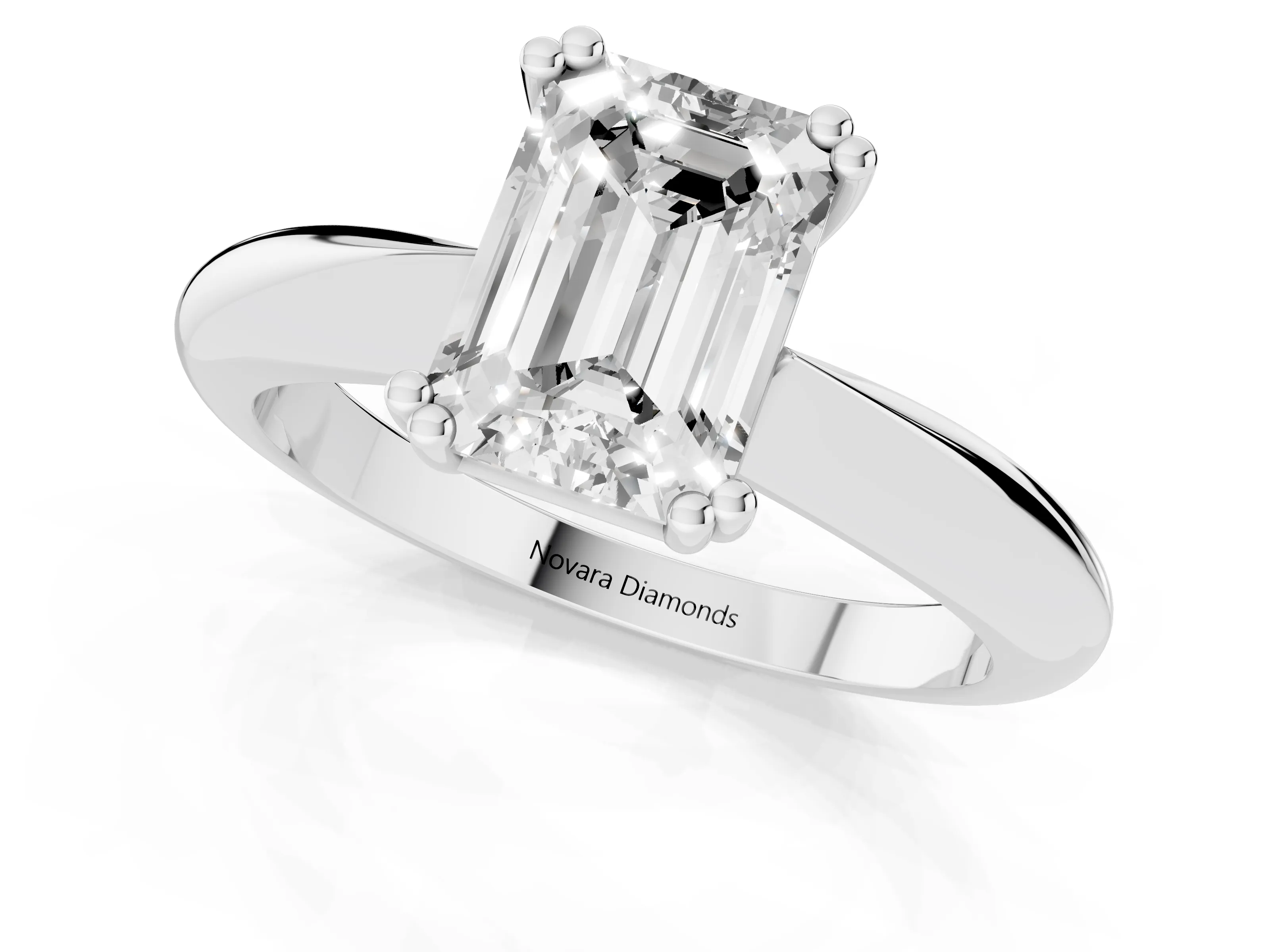 Emerald Cut Diamond Solitaire Engagement Ring Set in White gold with Tapered Band and Prong Setting – second view
