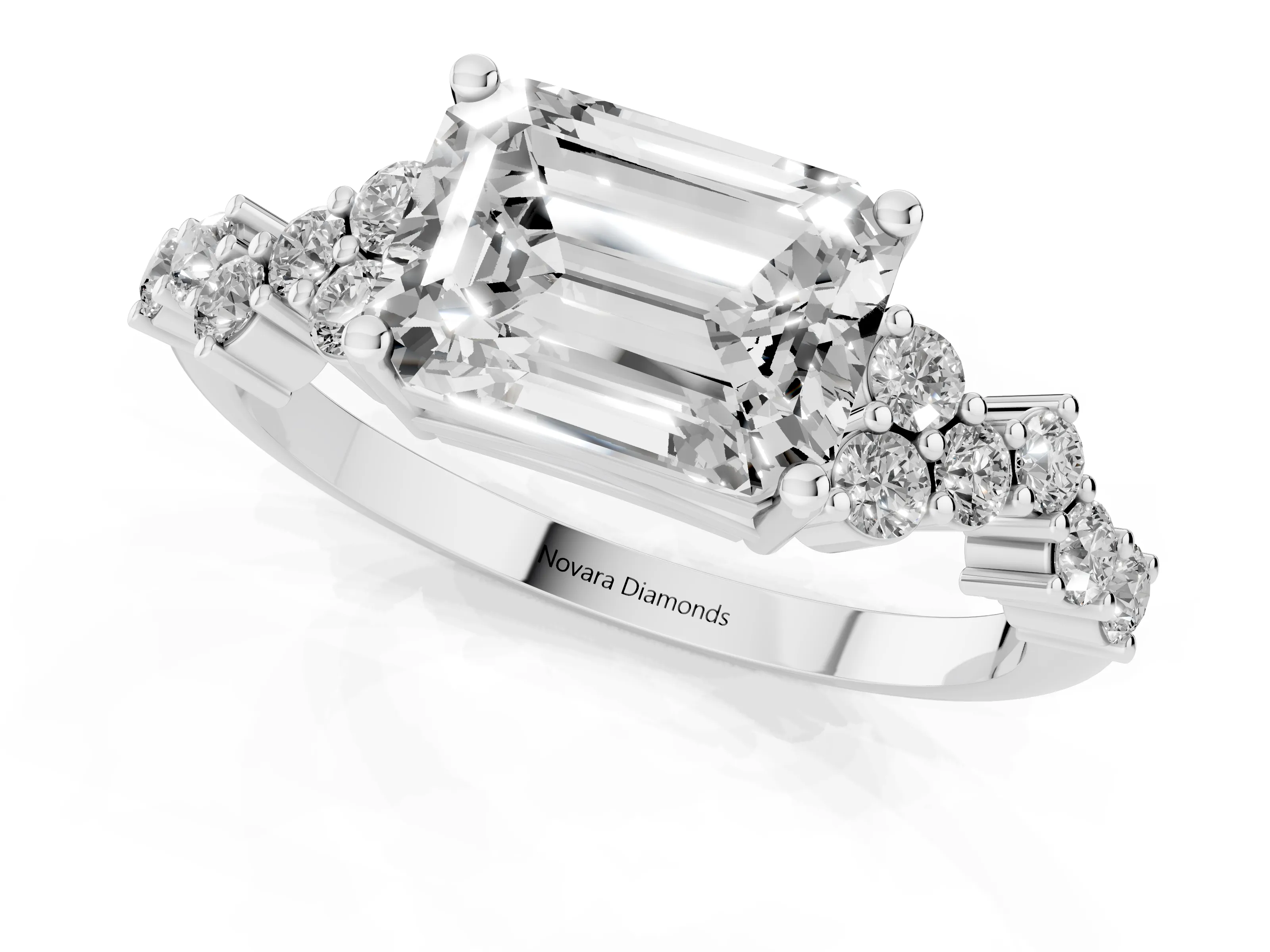 Emerald Cut Diamond Ring Set in Silver with Scattered Round Accents