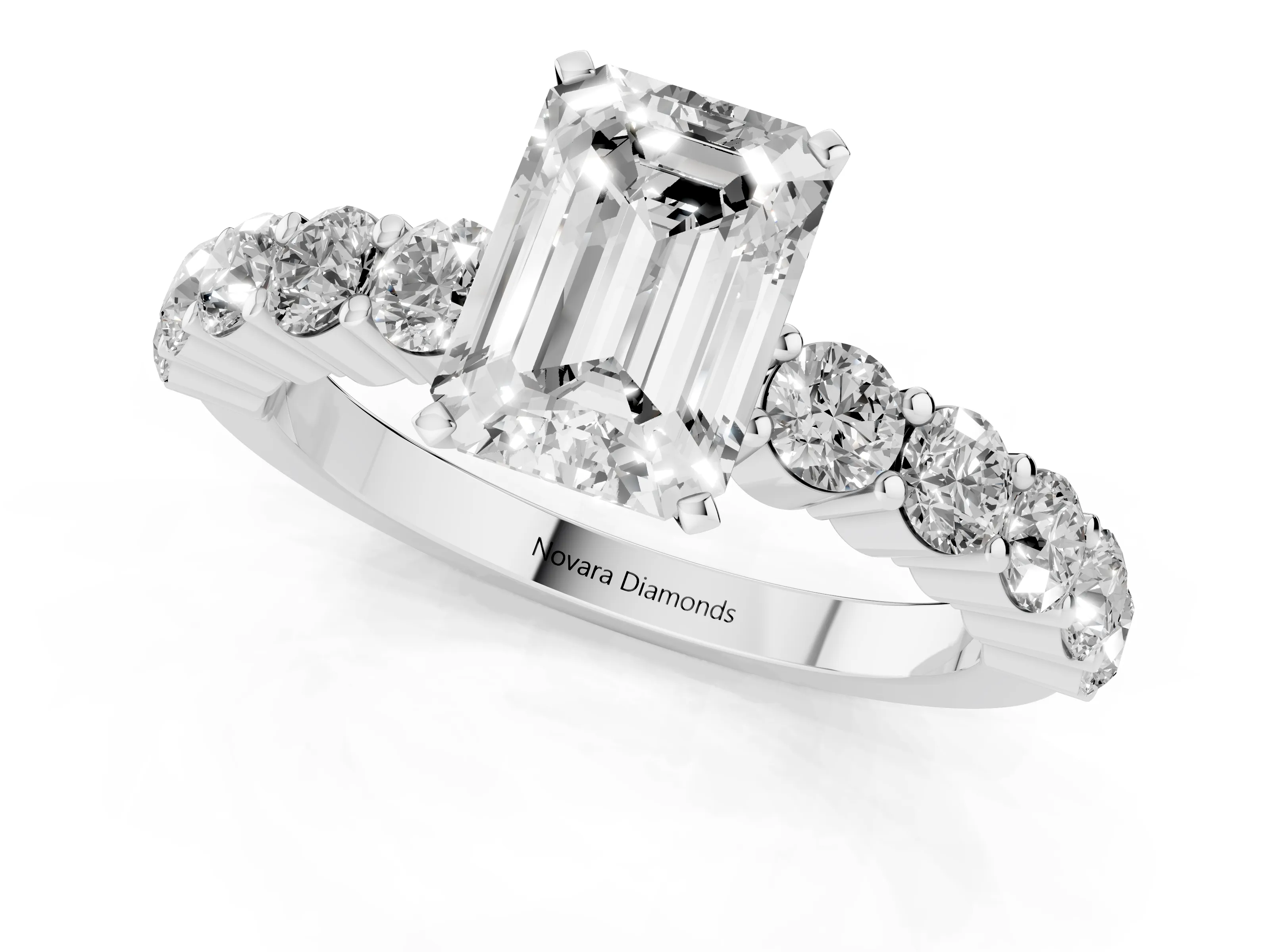 Emerald Cut Diamond Solitaire Ring Set in Silver with Shared Prong Round Side Stones