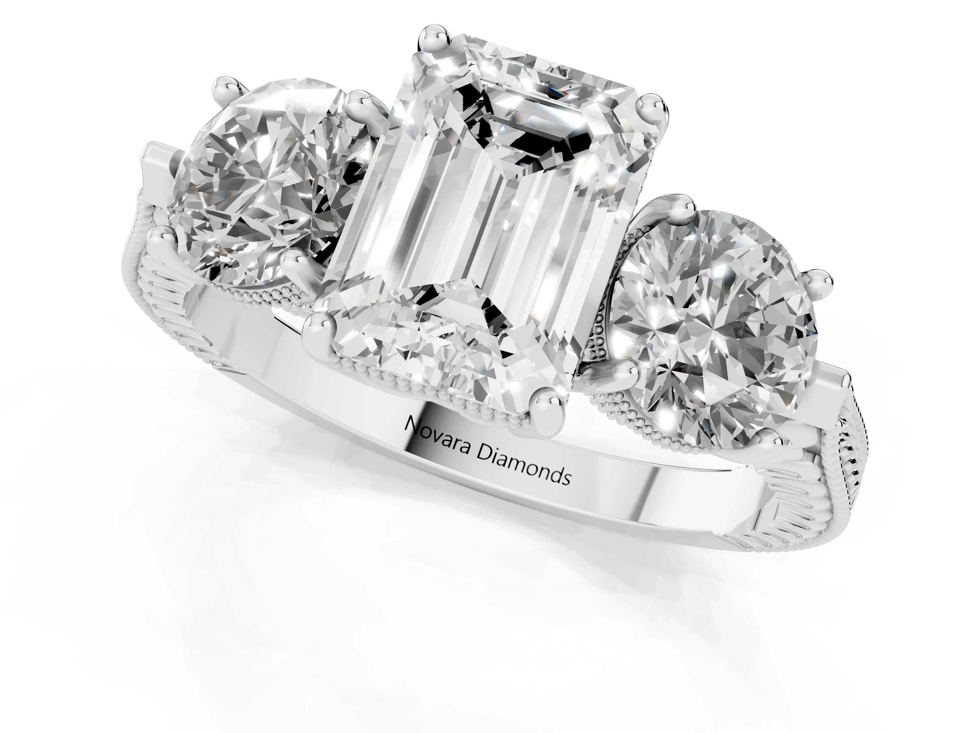 Emerald Cut Diamond Three-Stone Ring Set in Platinum with Milgrain Band