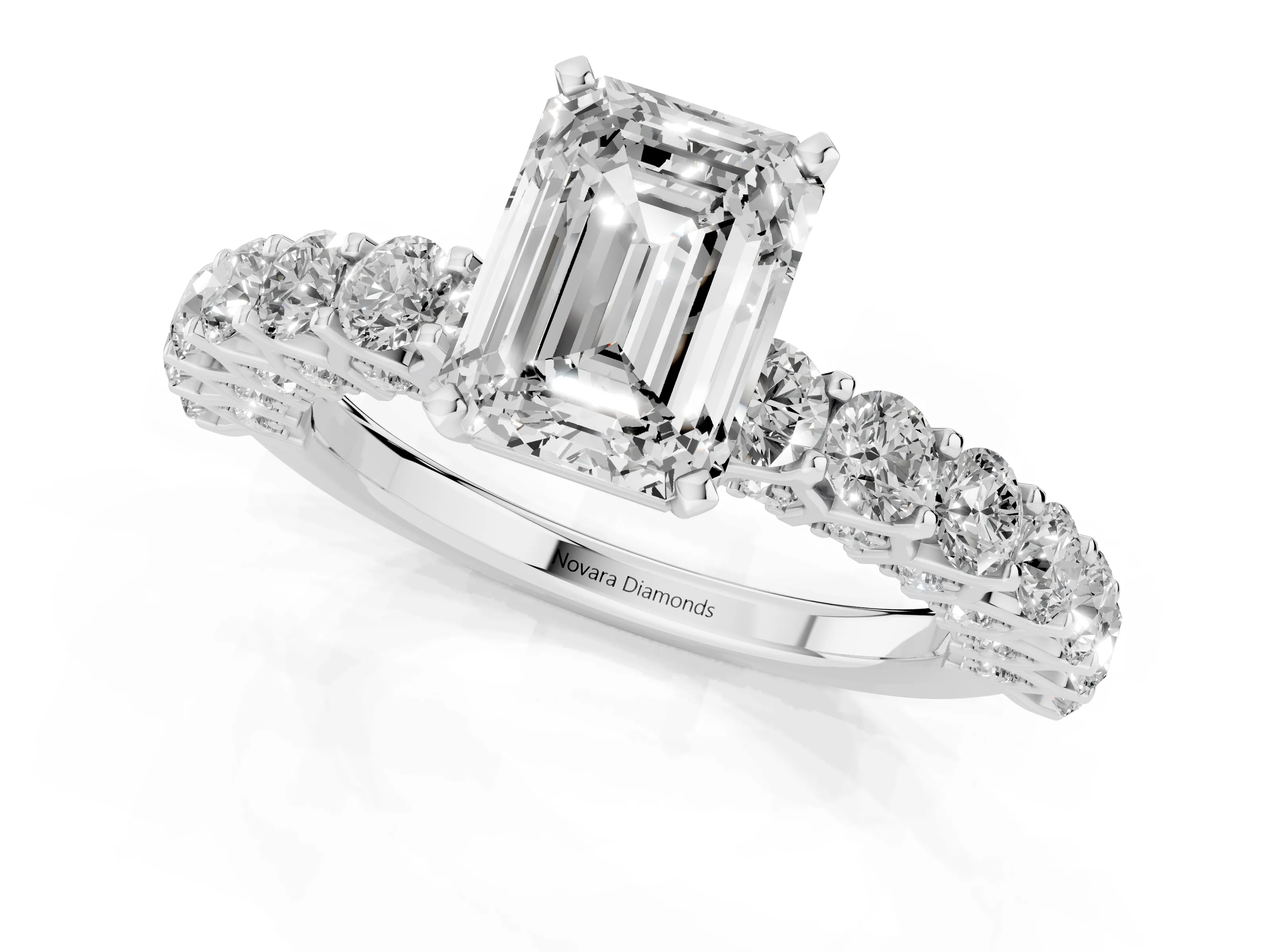 Emerald Cut Diamond Solitaire Ring Set in Platinum with Shared Prong Pavé Band
