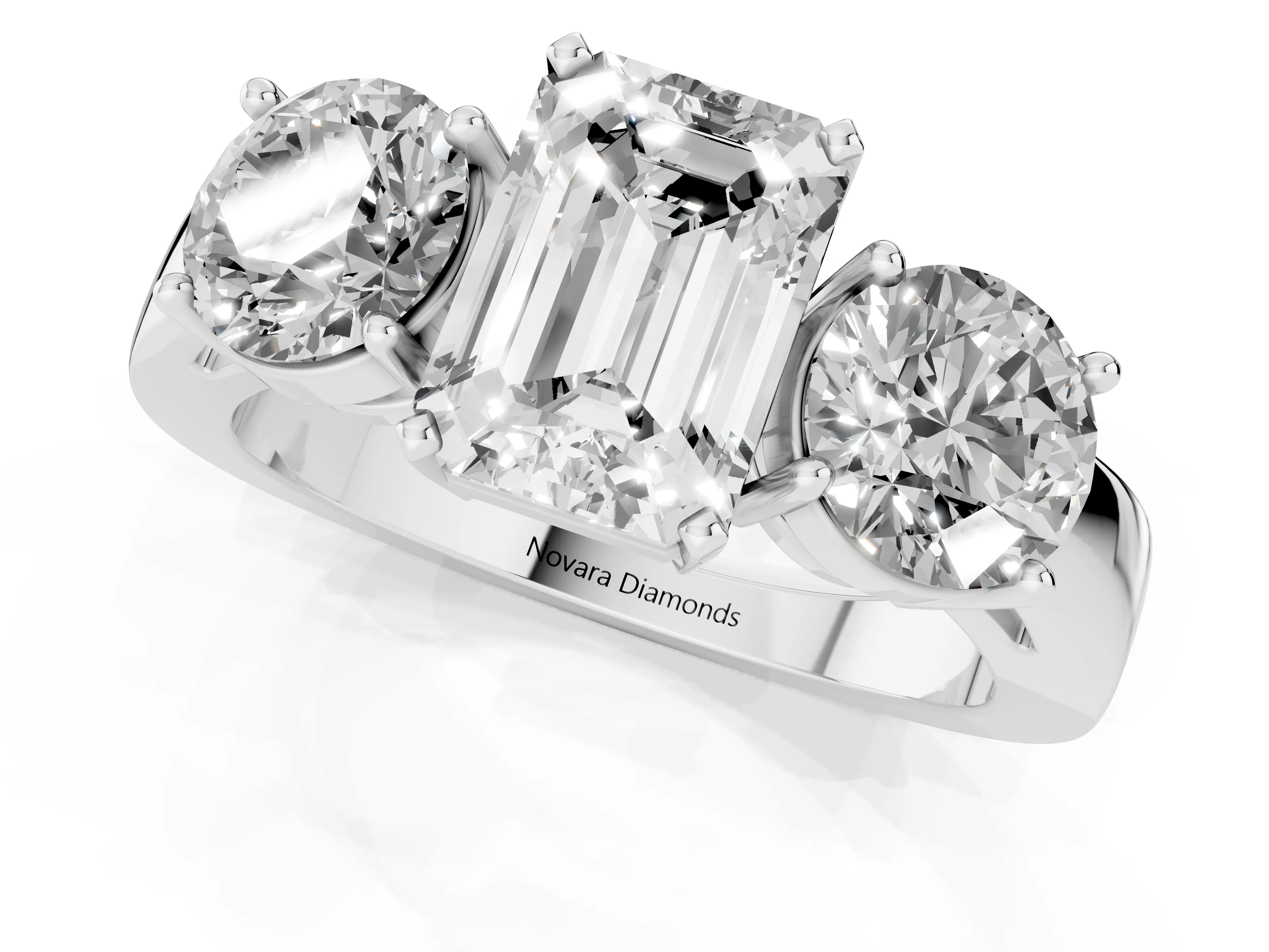 Emerald Cut Diamond Three-Stone Ring Set in White gold with Round Side Stones and Classic Band