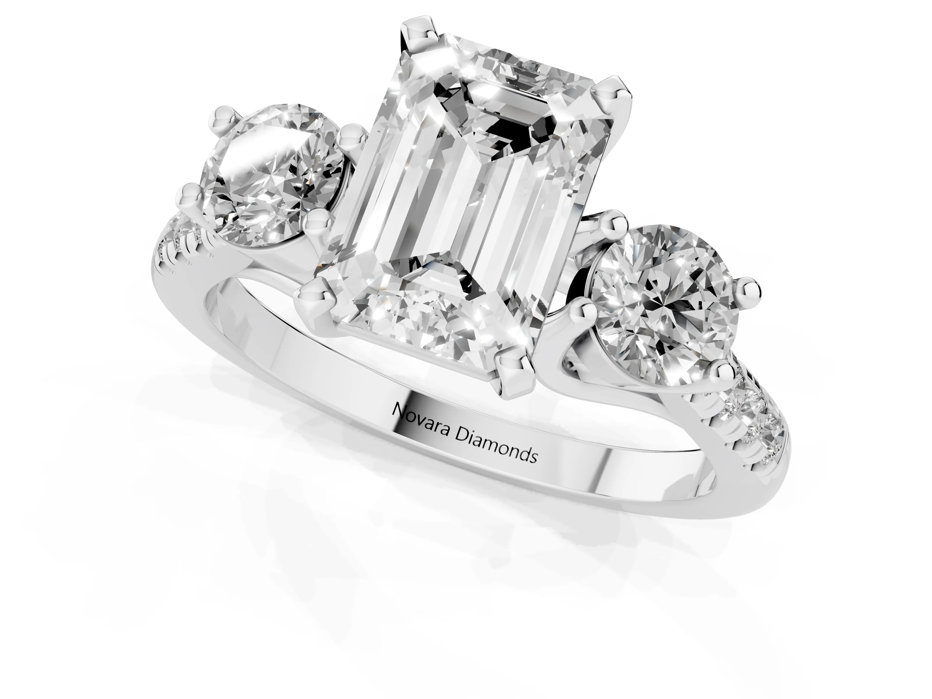 Three-Stone Emerald Cut Diamond Pavé Band Ring Set in Platinum with Prong-Set Trio