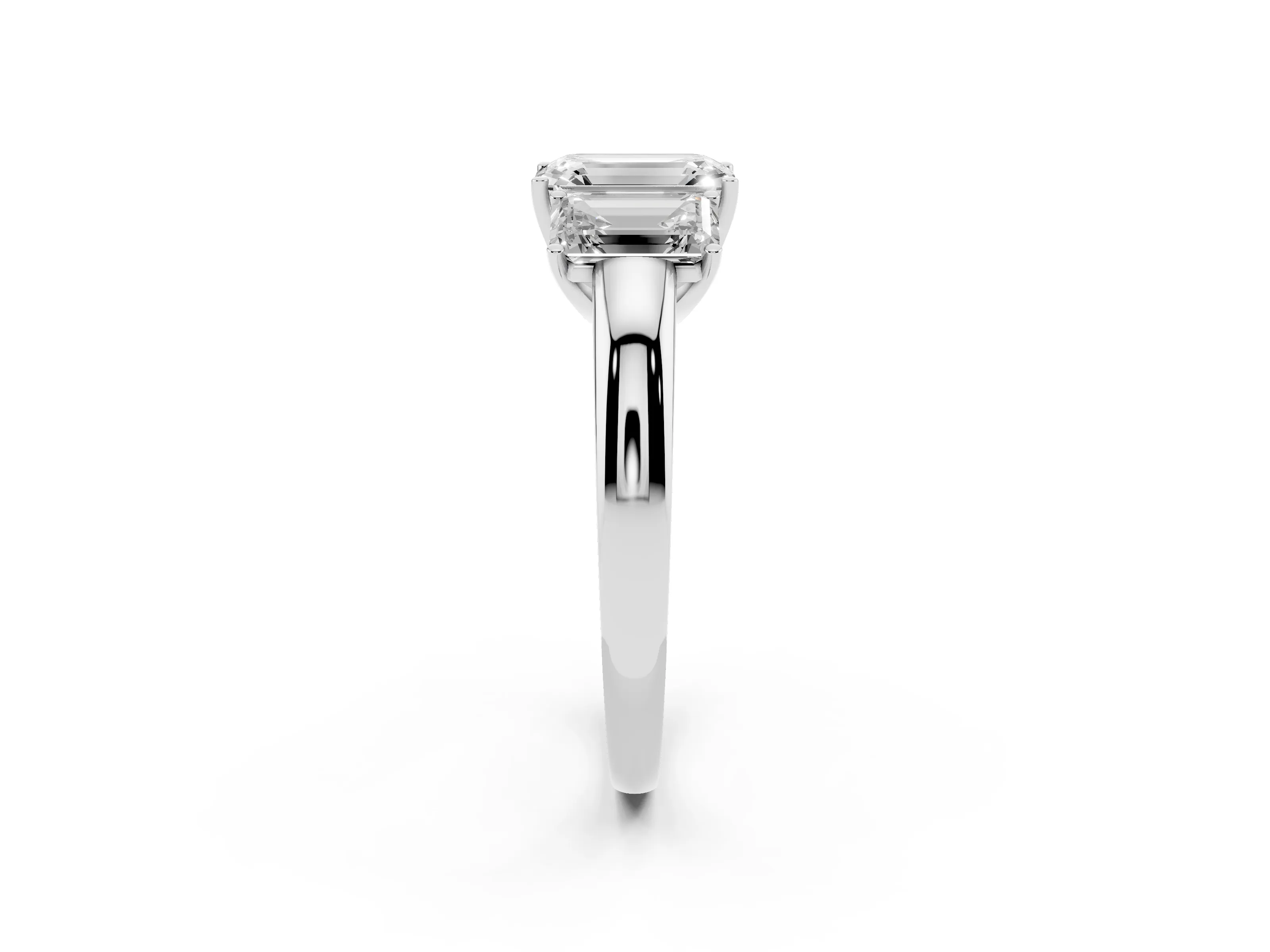 Emerald Cut Diamond Three-Stone Ring Set in Platinum with Bold Center and Classic Band