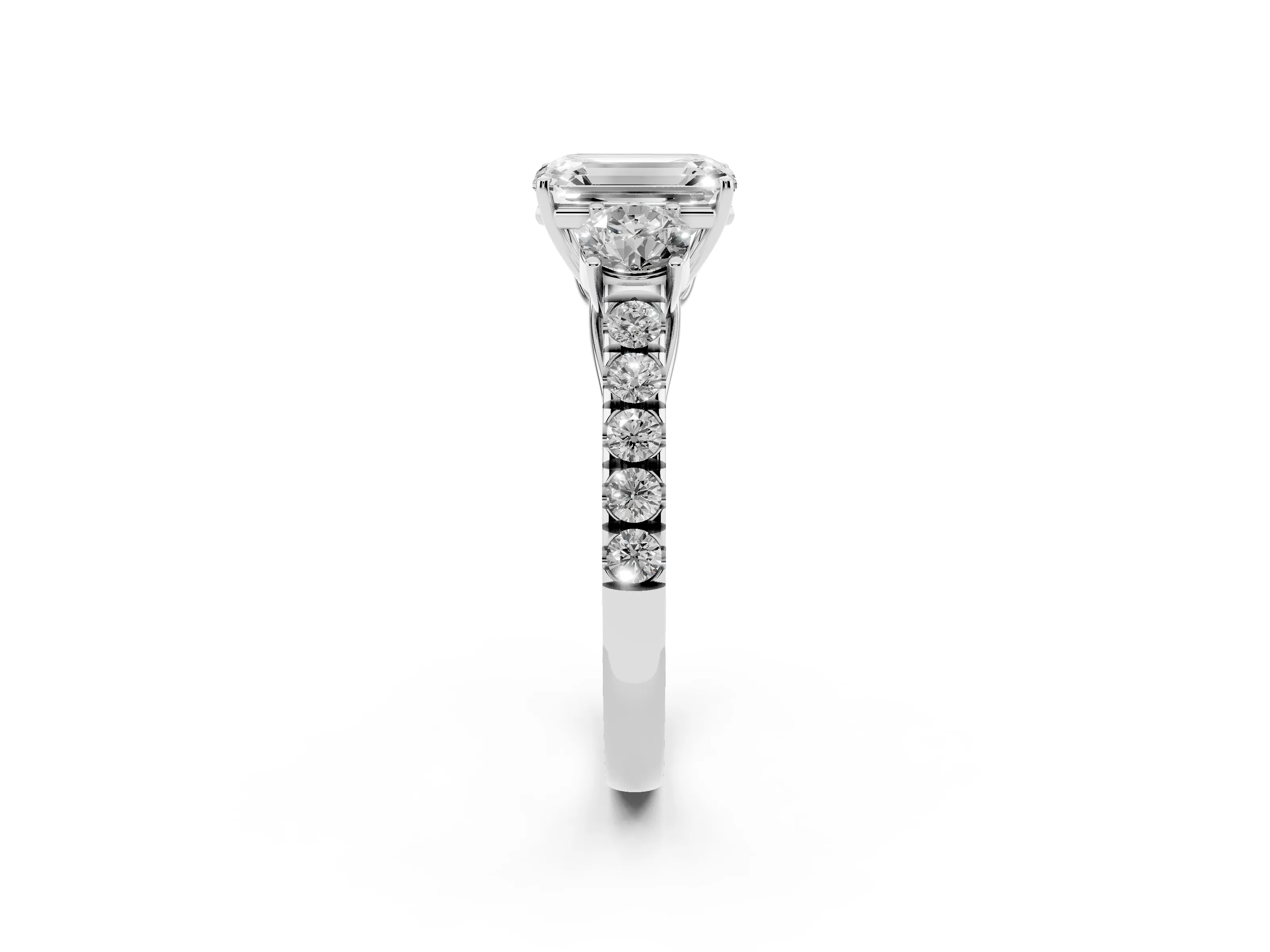 Emerald Cut Diamond Three-Stone Ring Set in White gold with Round Side Stones and Delicate Pavé Band