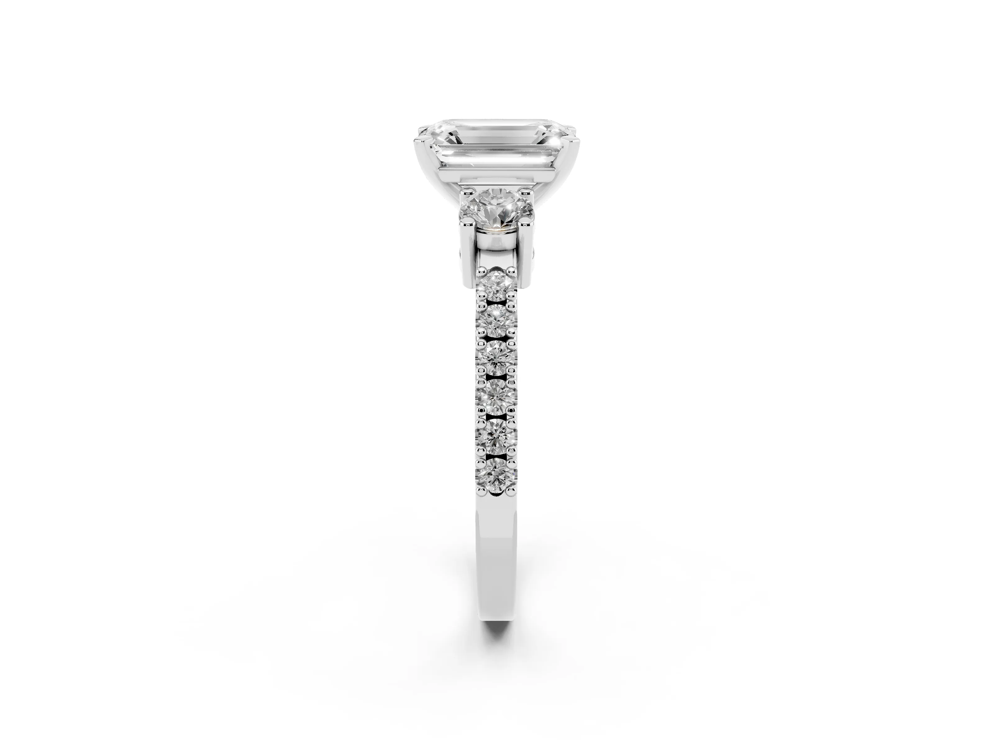 Three-Stone Emerald Cut Diamond Pavé Band Ring Set in Platinum with Prong Setting